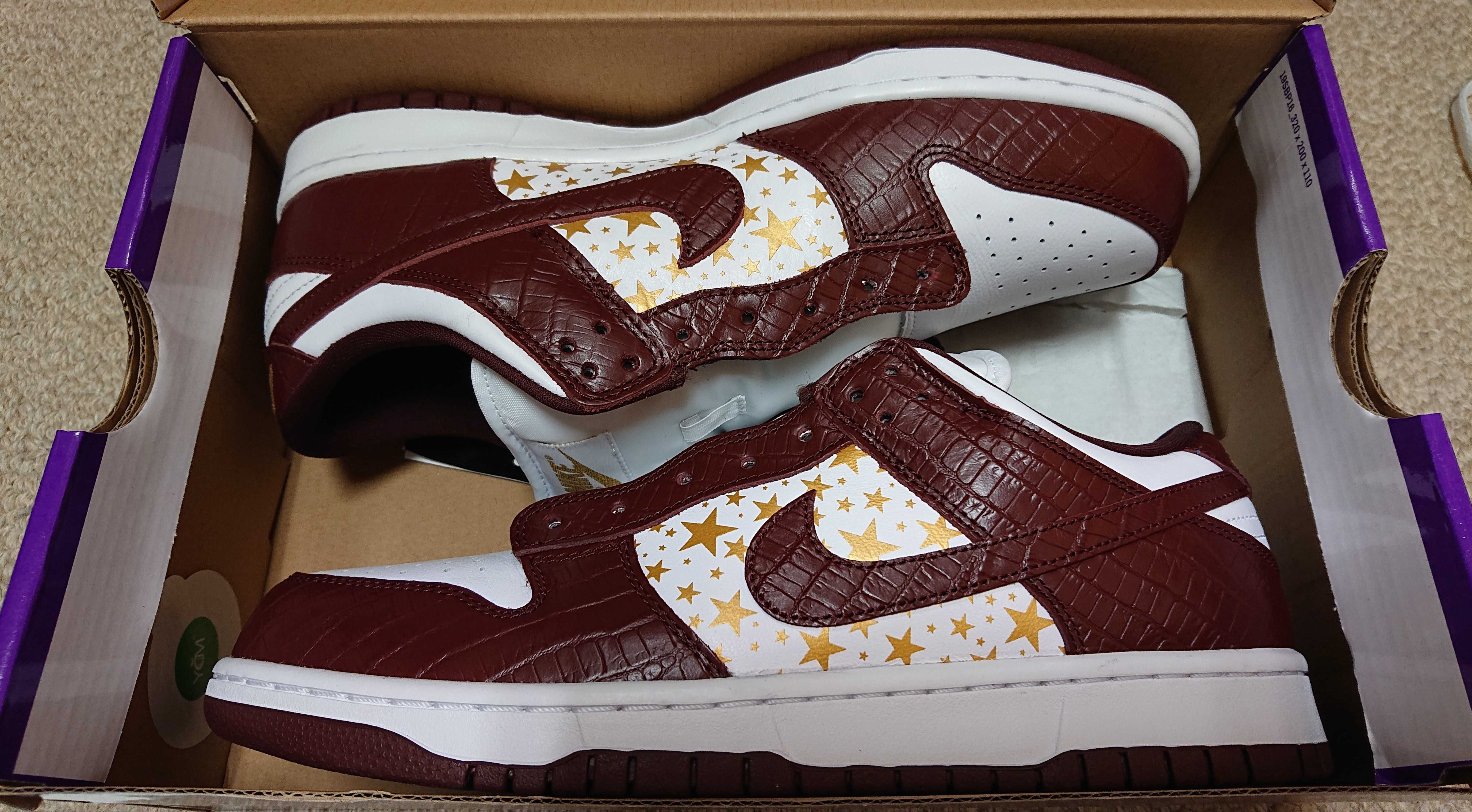 Supreme × Nike SB Dunk Low OG QS Gold Stars "White/Barkroot Brown"