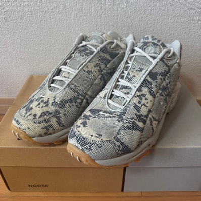 NOCTA × Nike Hot Step Air Terra "Light Bone/Snakeskin"