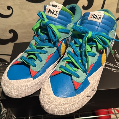 KAWS × sacai × Nike Blazer Low "Neptune Blue"
