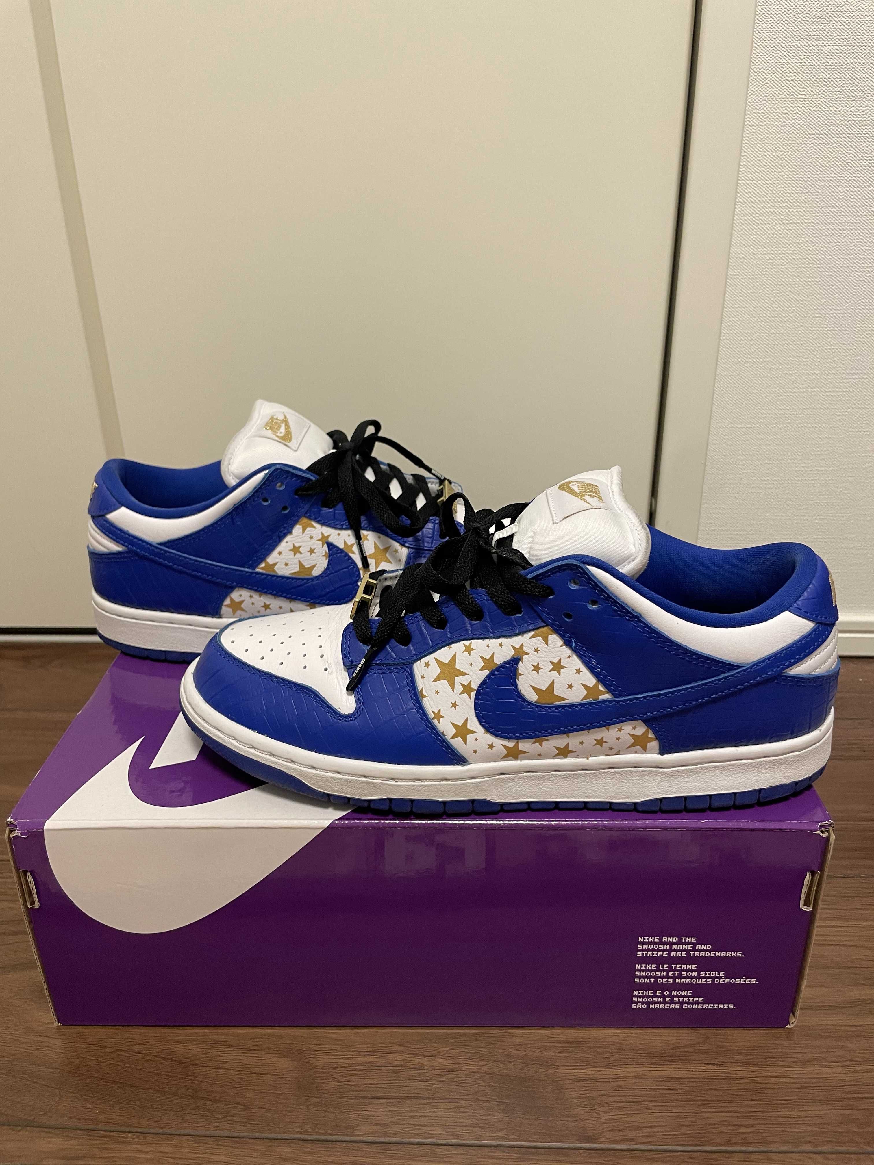 Supreme × Nike SB Dunk Low OG QS Gold Stars "White/Hyper Blue"