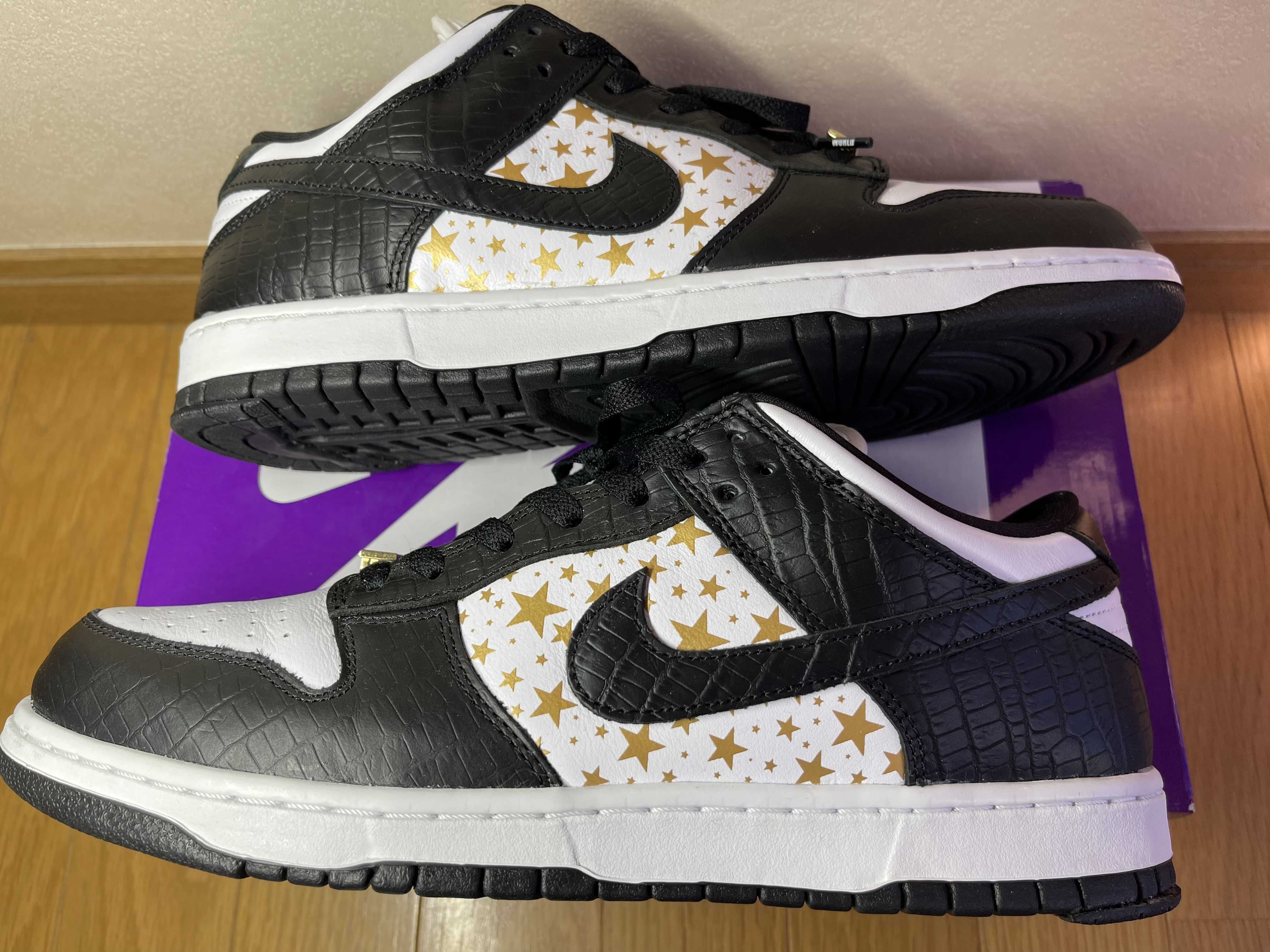 Supreme × Nike SB Dunk Low OG QS Gold Stars "White/Black"
