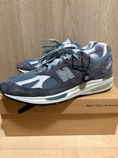 KITH × New Balance 991V2 "Asphalt/Lead/Oyster Mushroom"