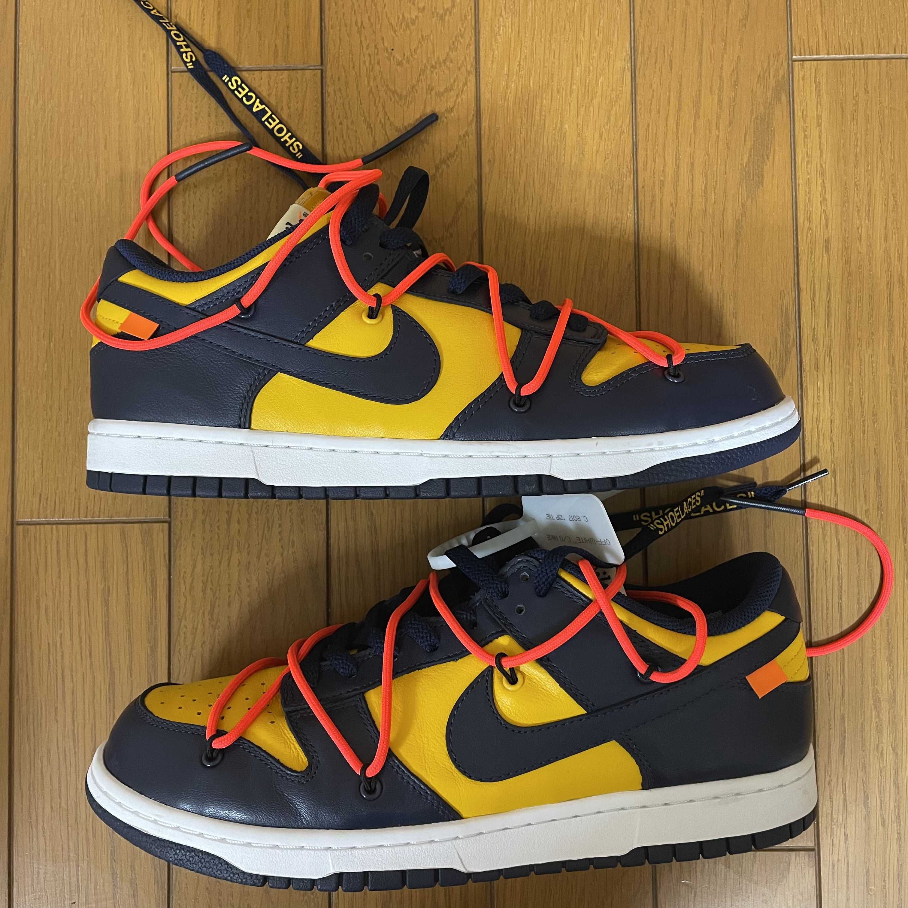 Off-White × Nike Dunk Low LTHR "University Gold/Midnight Navy/White"