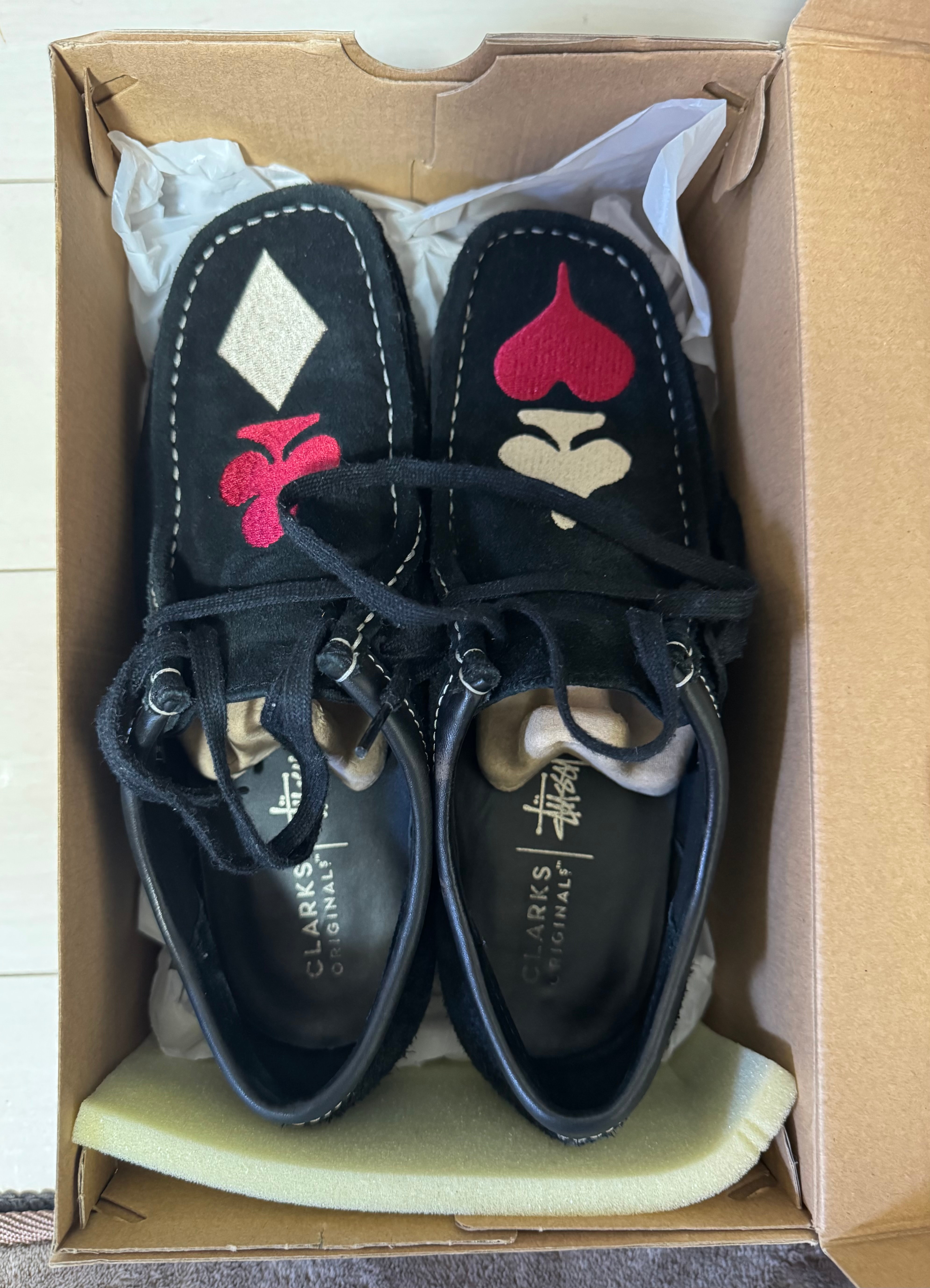 Stussy × Clarks Wallabee "Black Suede/Red/Gold"