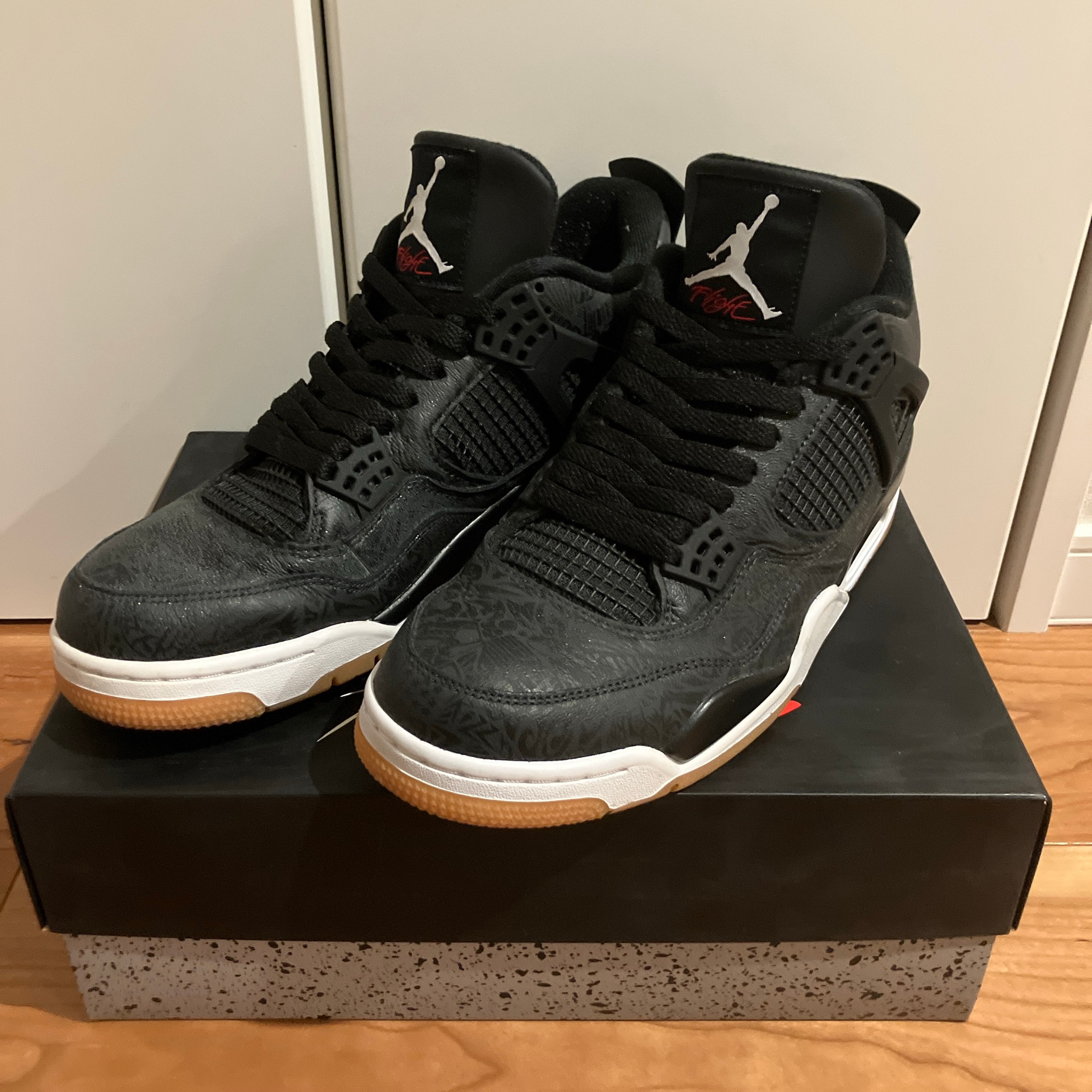 Nike Air Jordan 4 Retro "Laser Black/Gum"