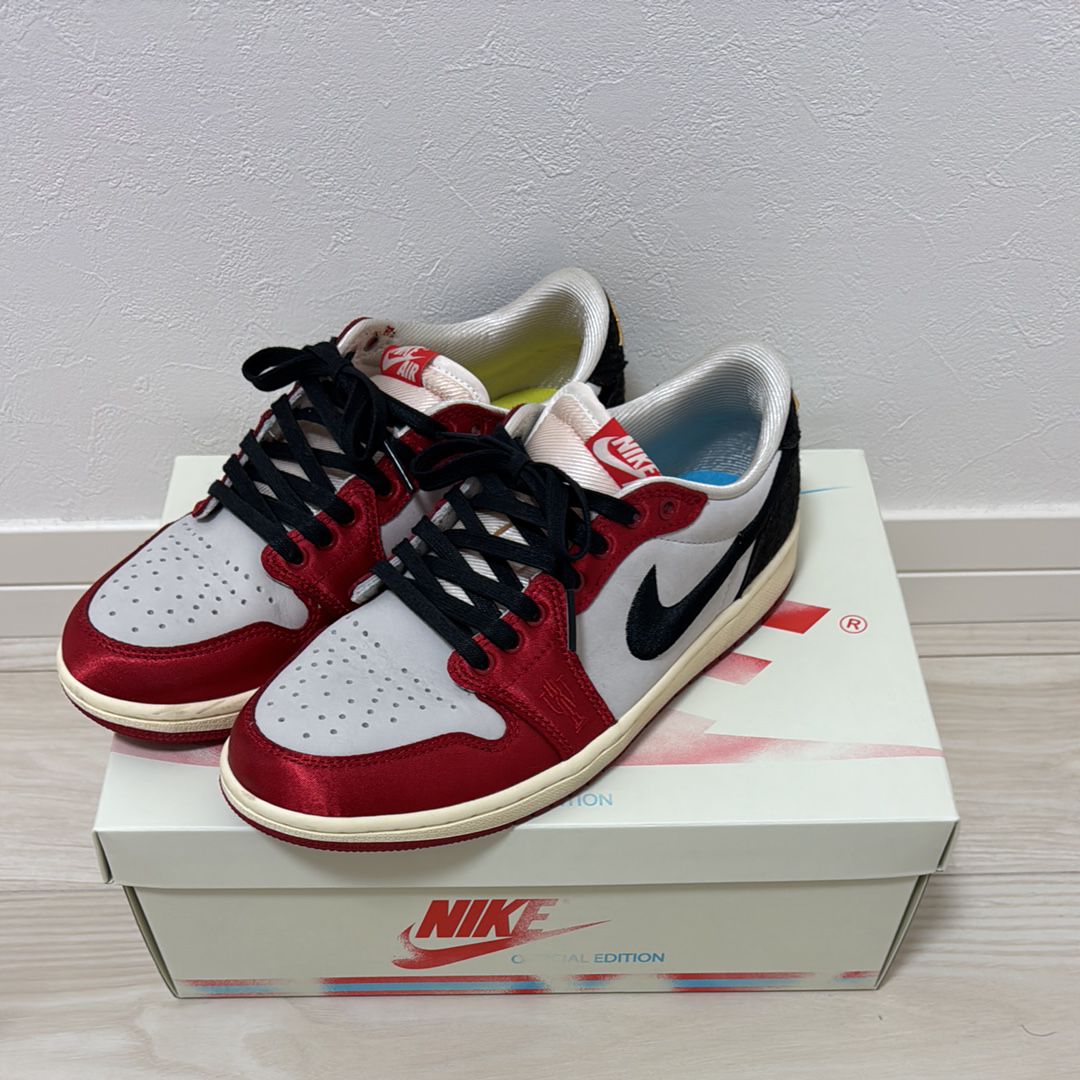 Trophy Room × Nike Air Jordan 1 Low OG "Sail and Varsity Red"