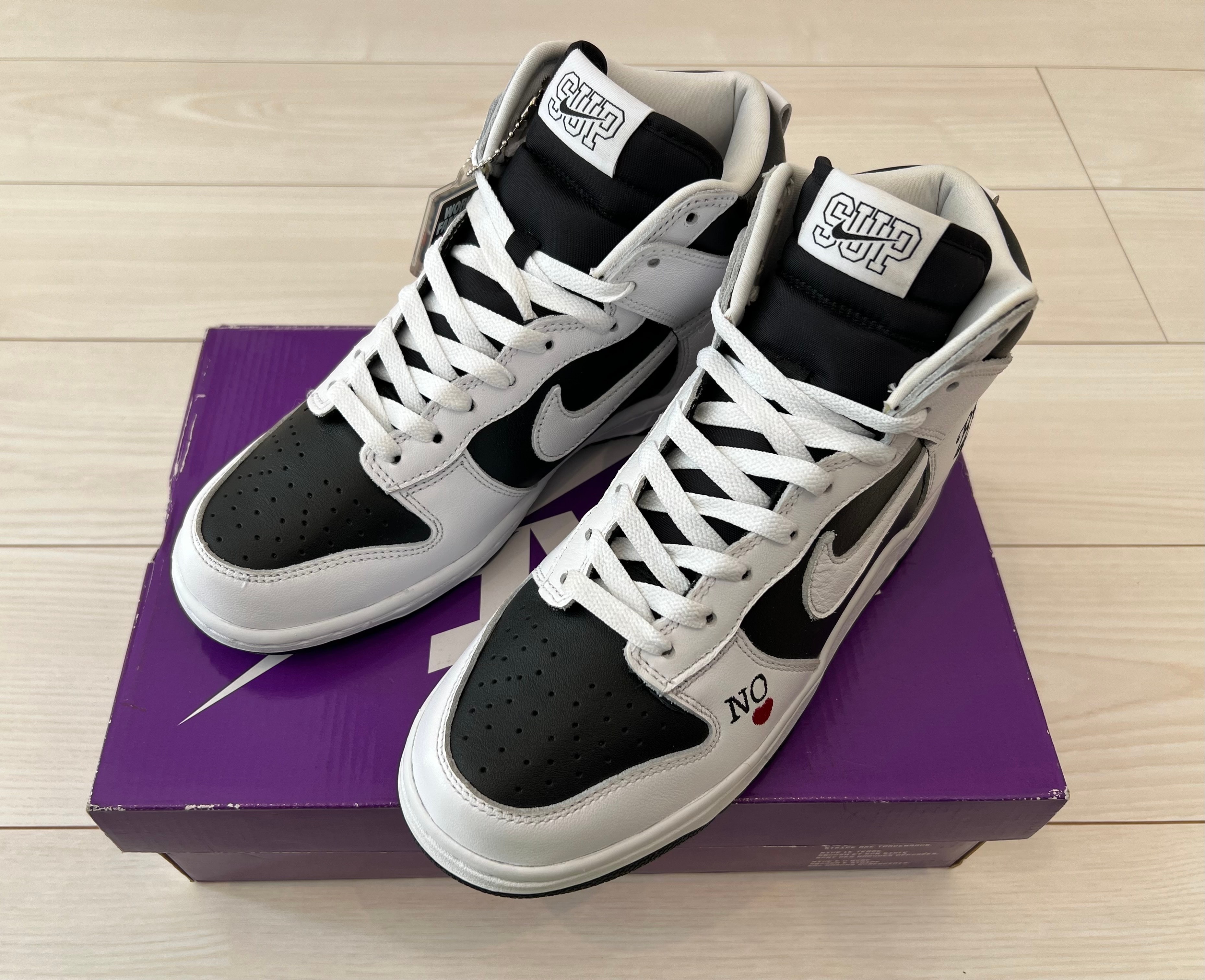 Supreme × Nike SB Dunk High By Any Means "White Black"