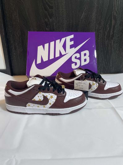 Supreme × Nike SB Dunk Low OG QS Gold Stars