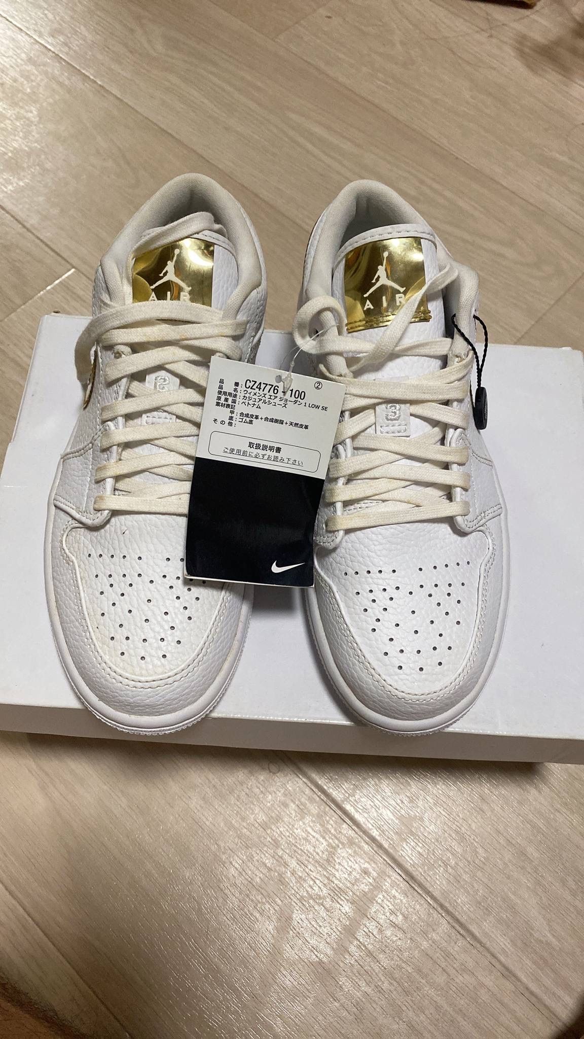 NIKE Women's AIR JORDAN 1 LOW SE "WHITE/GOLD"