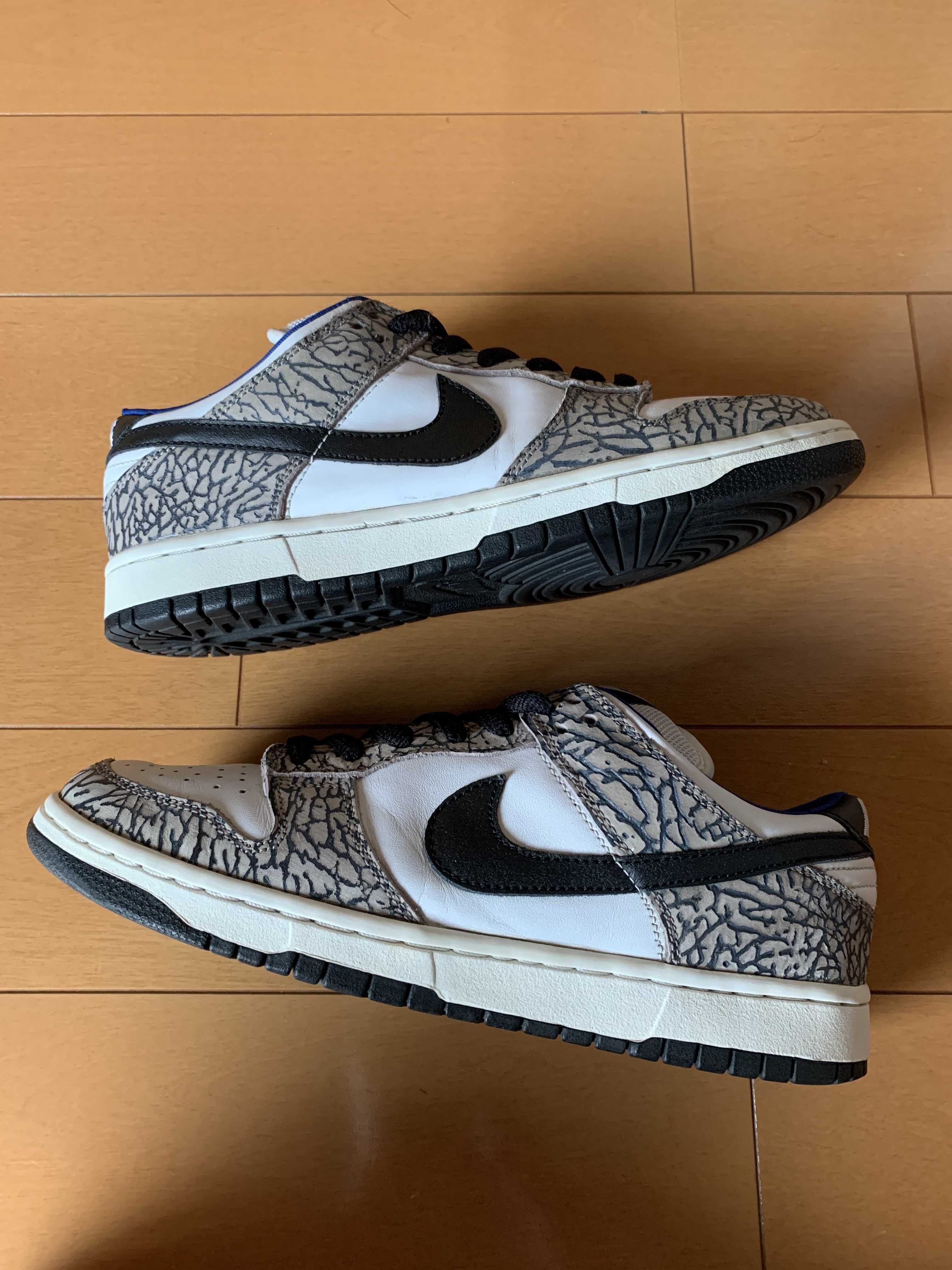 Supreme × Nike SB Dunk Low "White Cement/Safari" (2002)