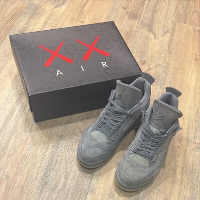 KAWS × Nike Air Jordan 4 Retro "Grey"