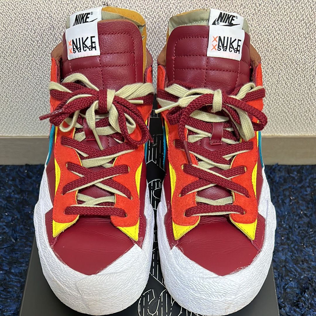 KAWS × sacai × Nike Blazer Low "Team Red"