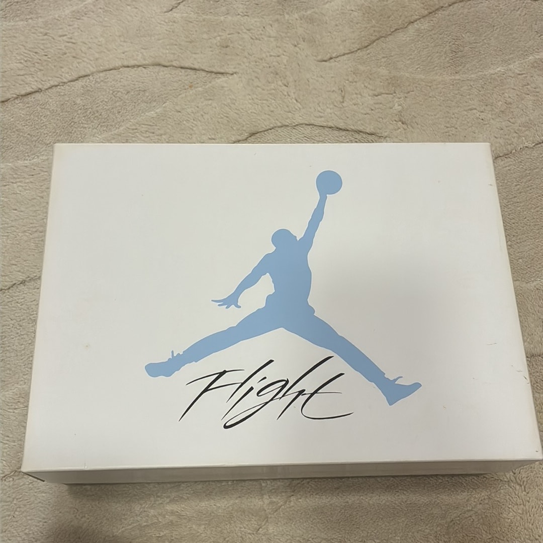 Nike Air Jordan 4 "University Blue"