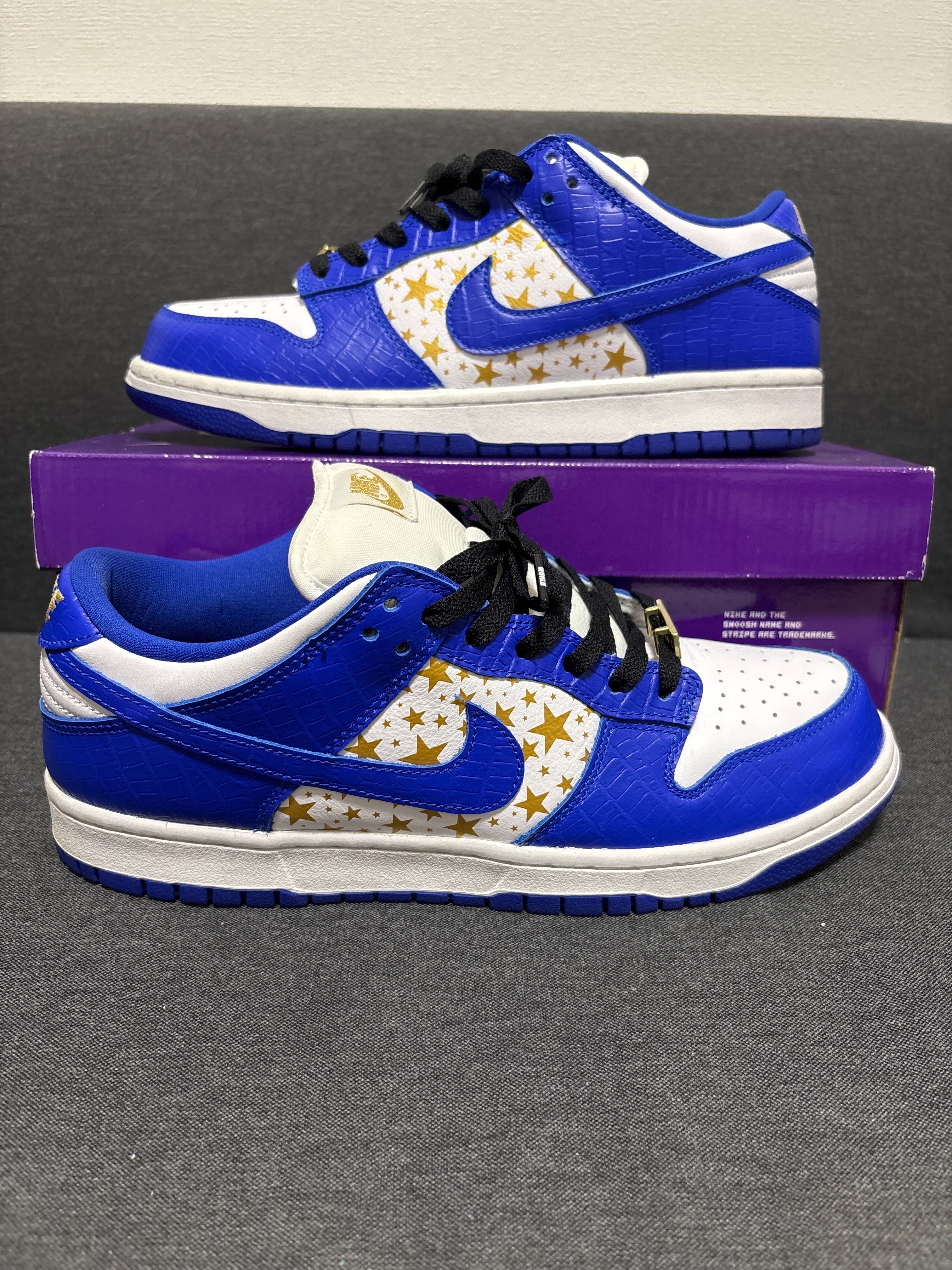 Supreme × Nike SB Dunk Low OG QS Gold Stars 