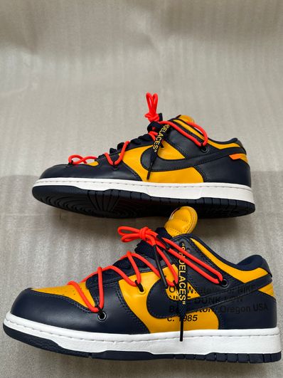 Off-White × Nike Dunk Low LTHR "University Gold/Midnight Navy/White"