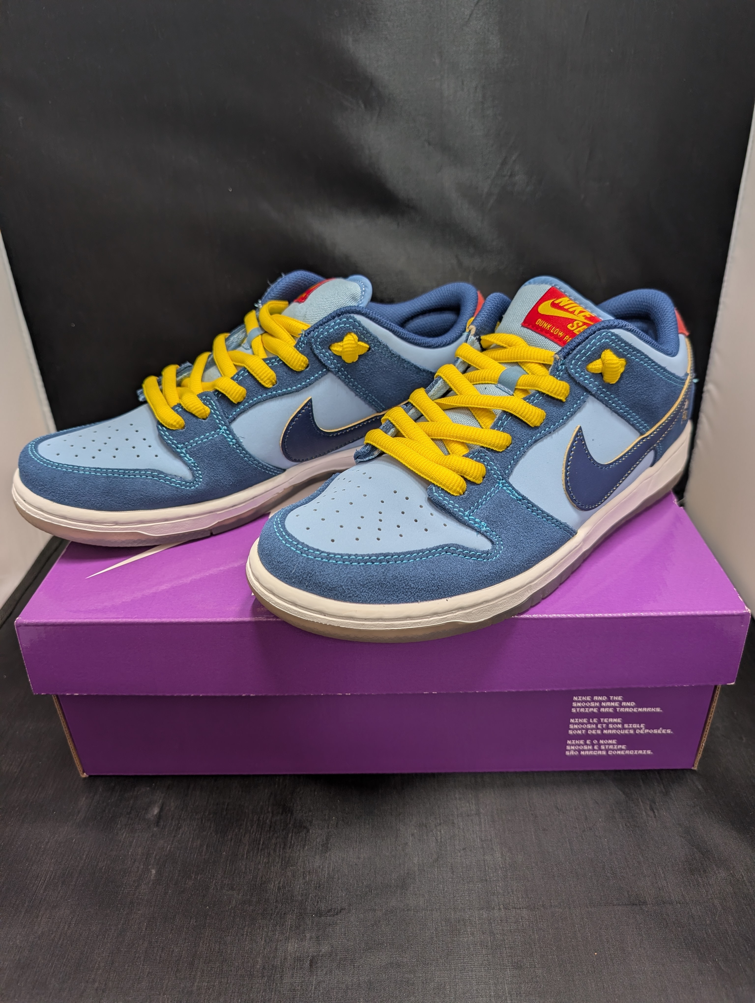 Why So Sad? × Nike SB Dunk Low "Coastal Blue/Speed Yellow-University Red"