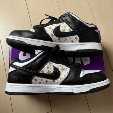 Supreme × Nike SB Dunk Low OG QS Gold Stars "White/Black"