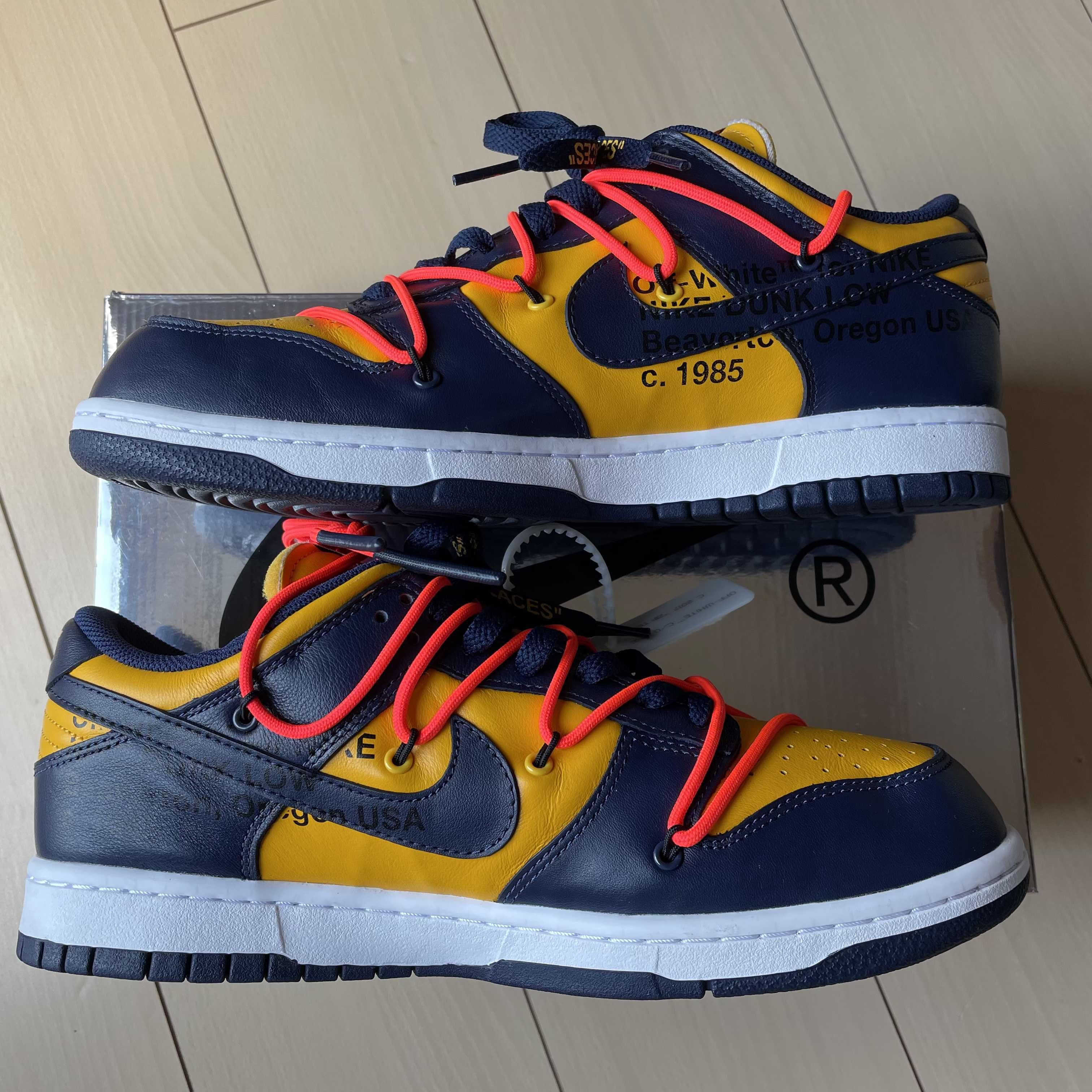 Off-White × Nike Dunk Low LTHR "University Gold/Midnight Navy/White"