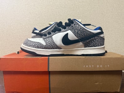 Supreme × Nike SB Dunk Low "White Cement/Safari" (2002)