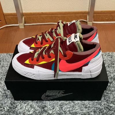 KAWS × sacai × Nike Blazer Low "Team Red"