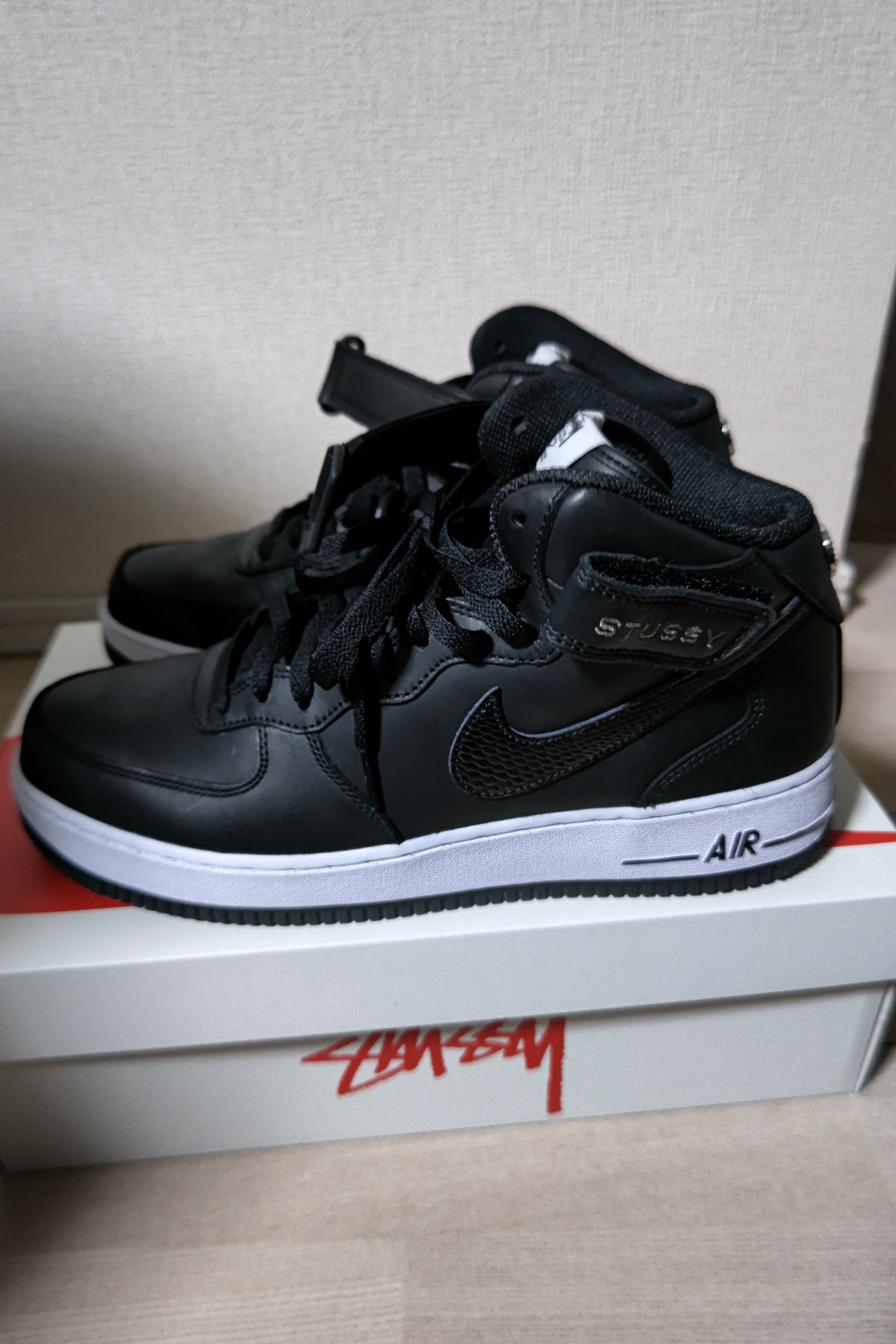 Stussy × Nike Air Force 1 Mid "Black/Black"