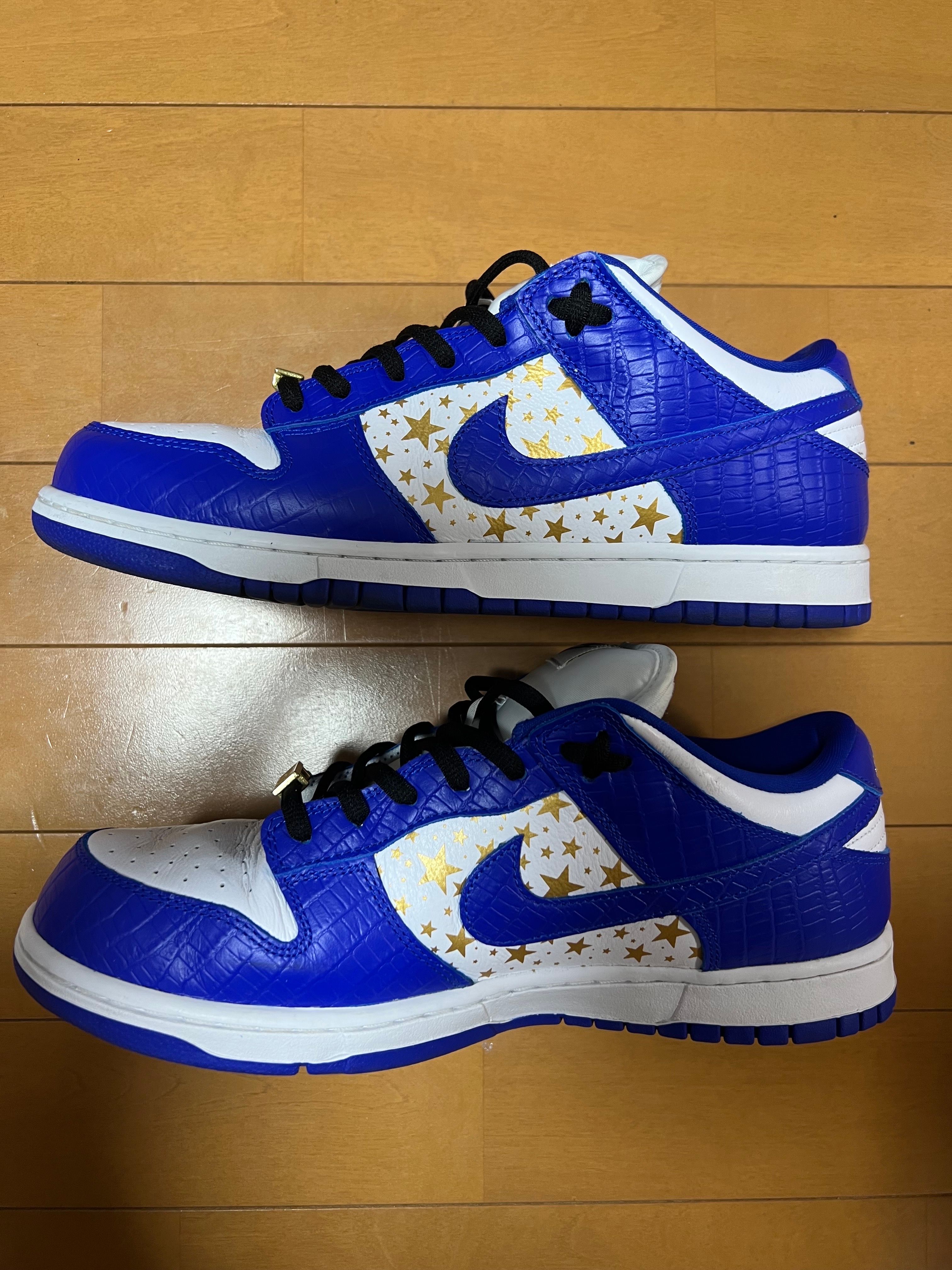 Supreme × Nike SB Dunk Low OG QS Gold Stars "White/Hyper Blue"