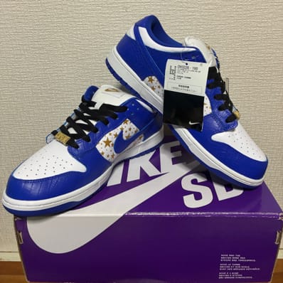 Supreme × Nike SB Dunk Low OG QS Gold Stars "White/Hyper Blue"