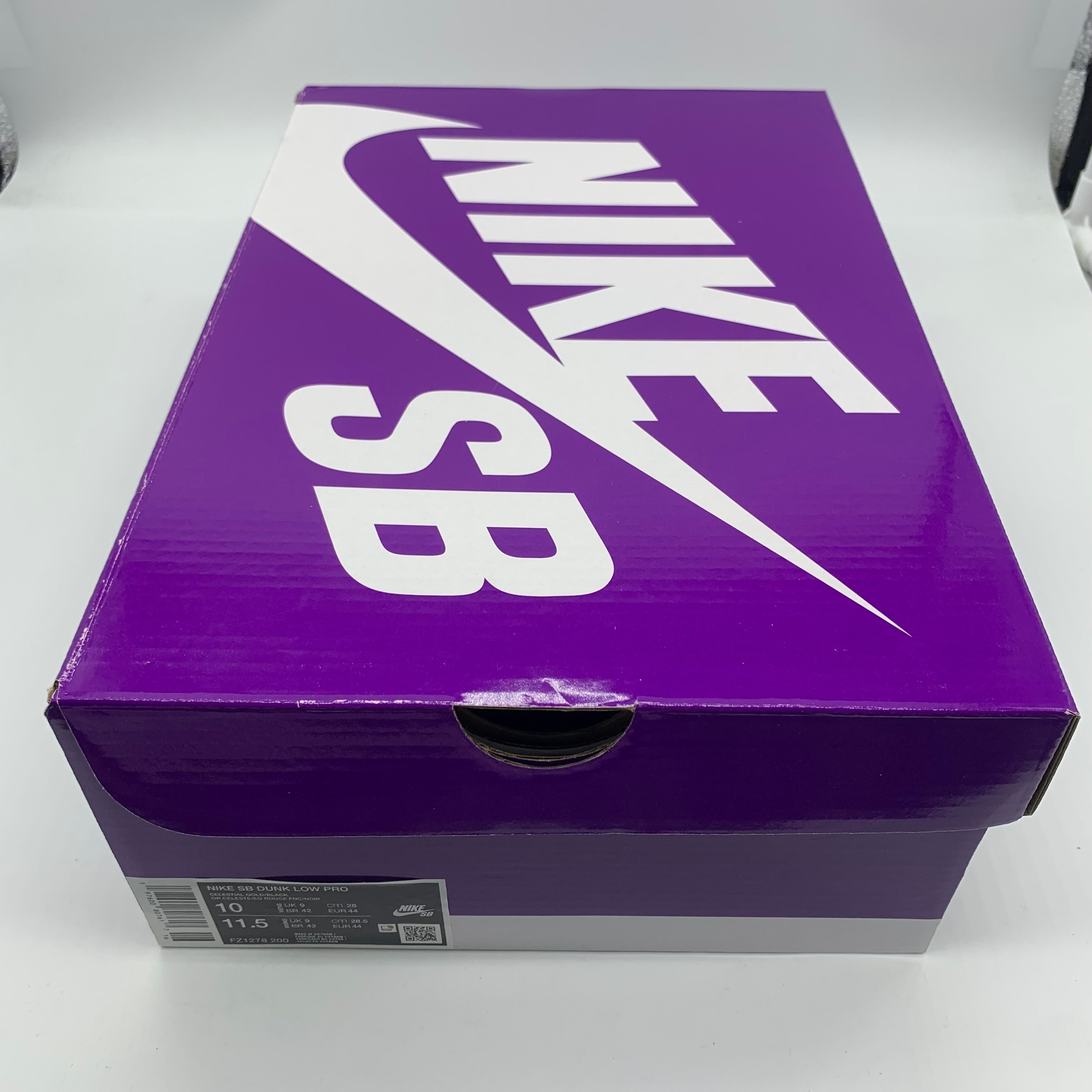 Nike SB Dunk Low Pro "City of Cinema/Celestial Gold and Dark Team Red"