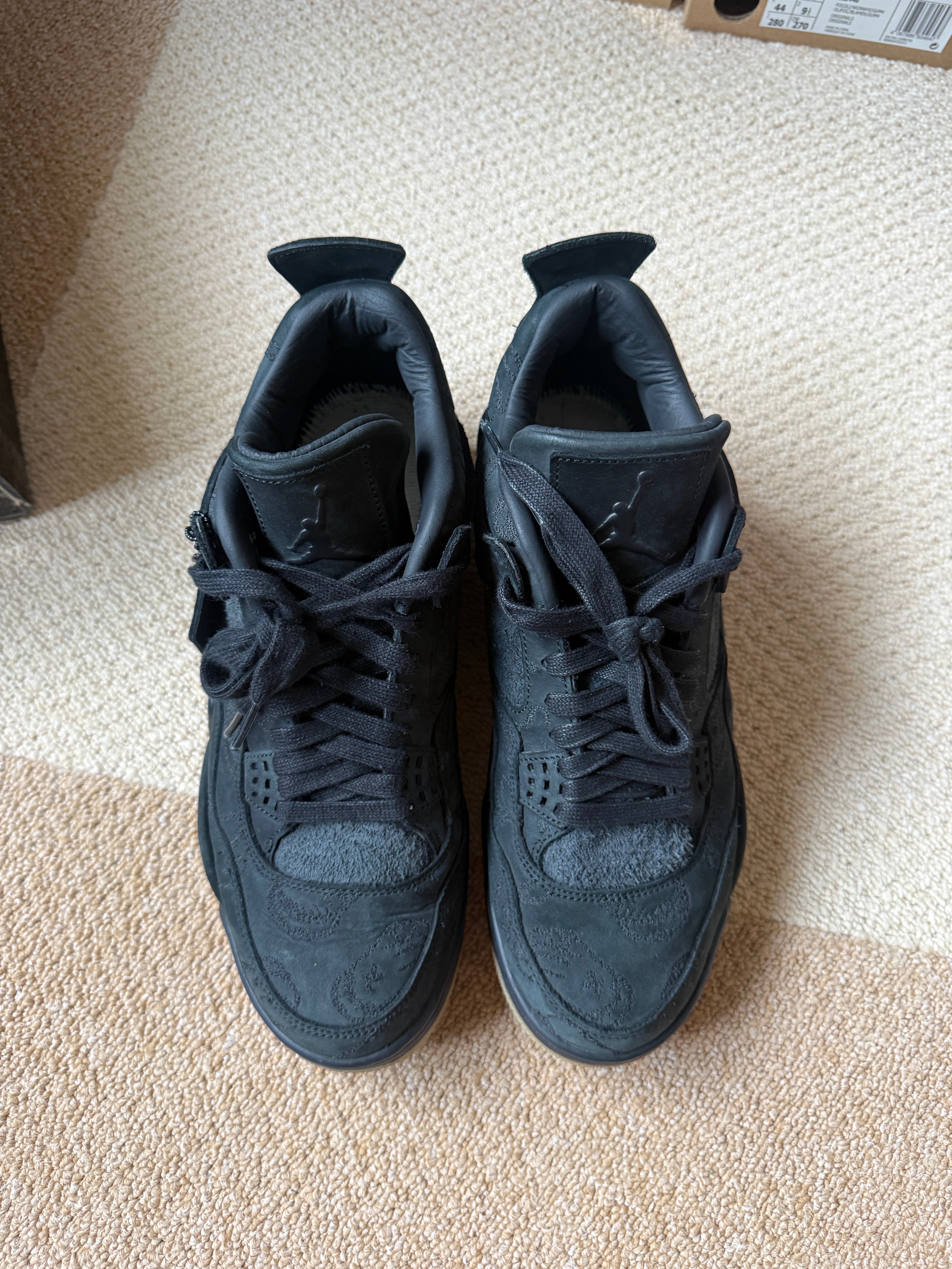 KAWS × Nike Air Jordan 4 Retro "Black"