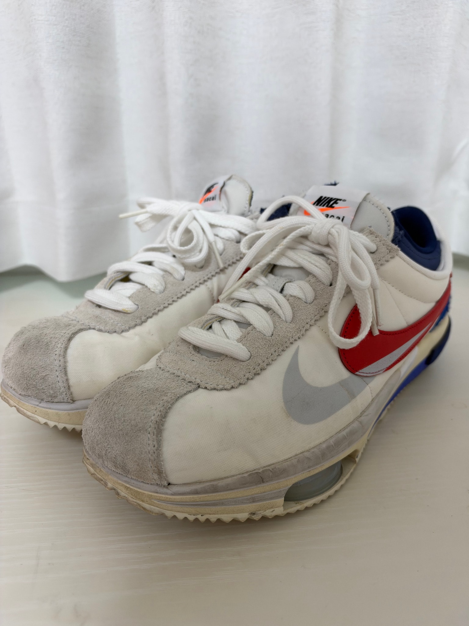 sacai × Nike Zoom Cortez "White and University Red"