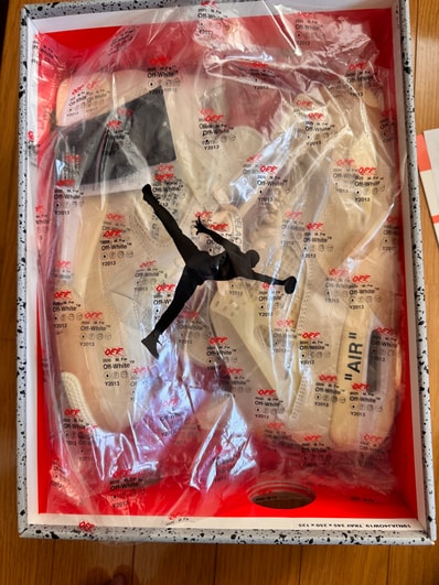 Off-White × Nike Women's Air Jordan 4 SP "Sail"