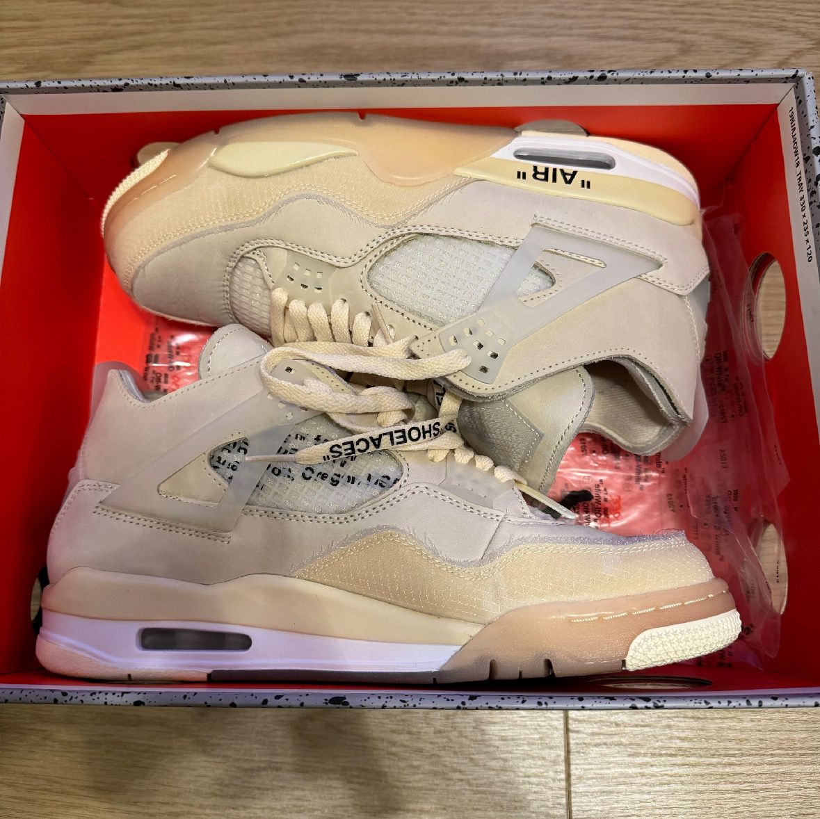 Off-White × Nike Women's Air Jordan 4 SP "Sail"