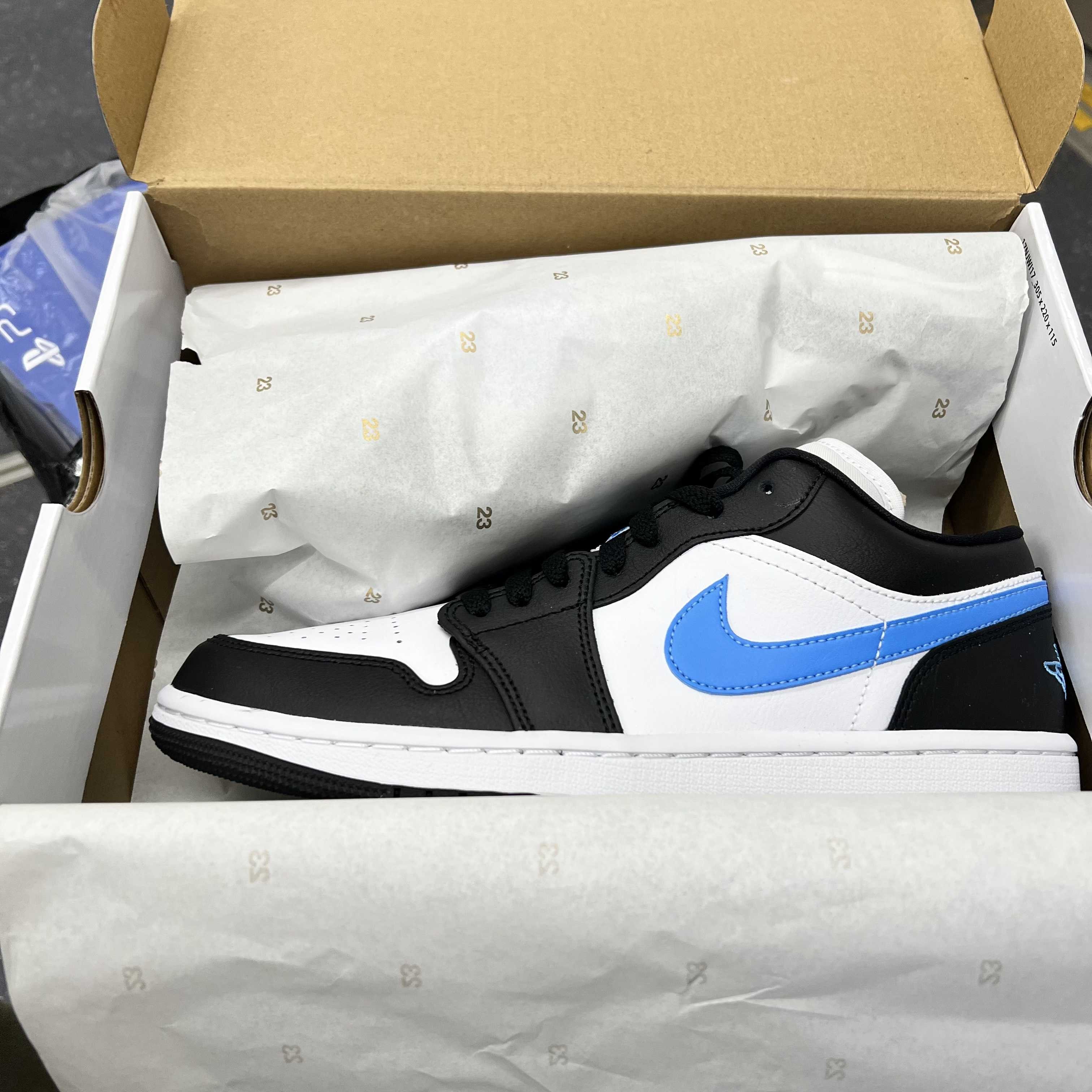 Nike Women's Air Jordan 1 Low "Black/University Blue"