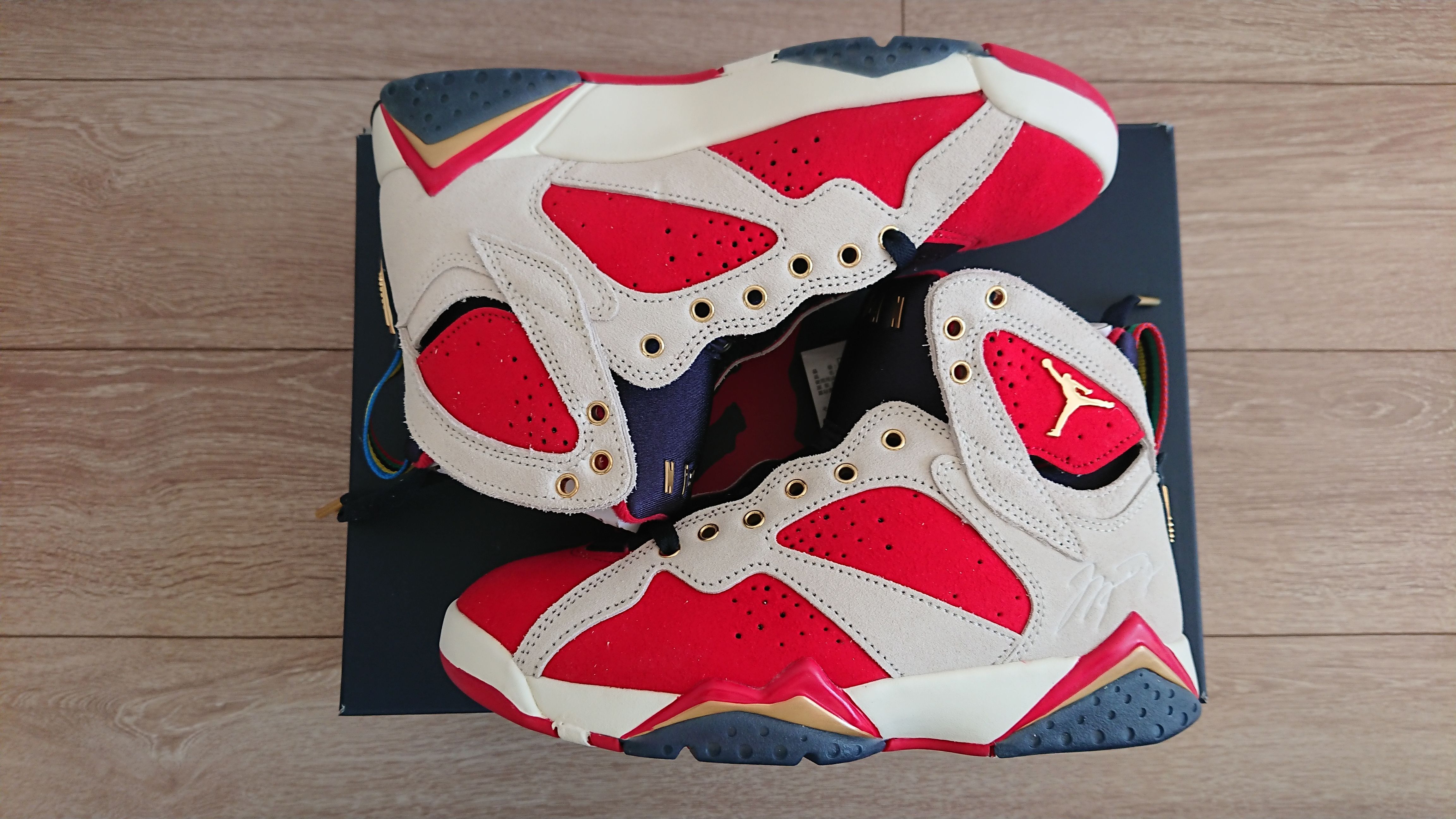 Trophy Room × Nike Air Jordan 7 "True Red and Obsidian"