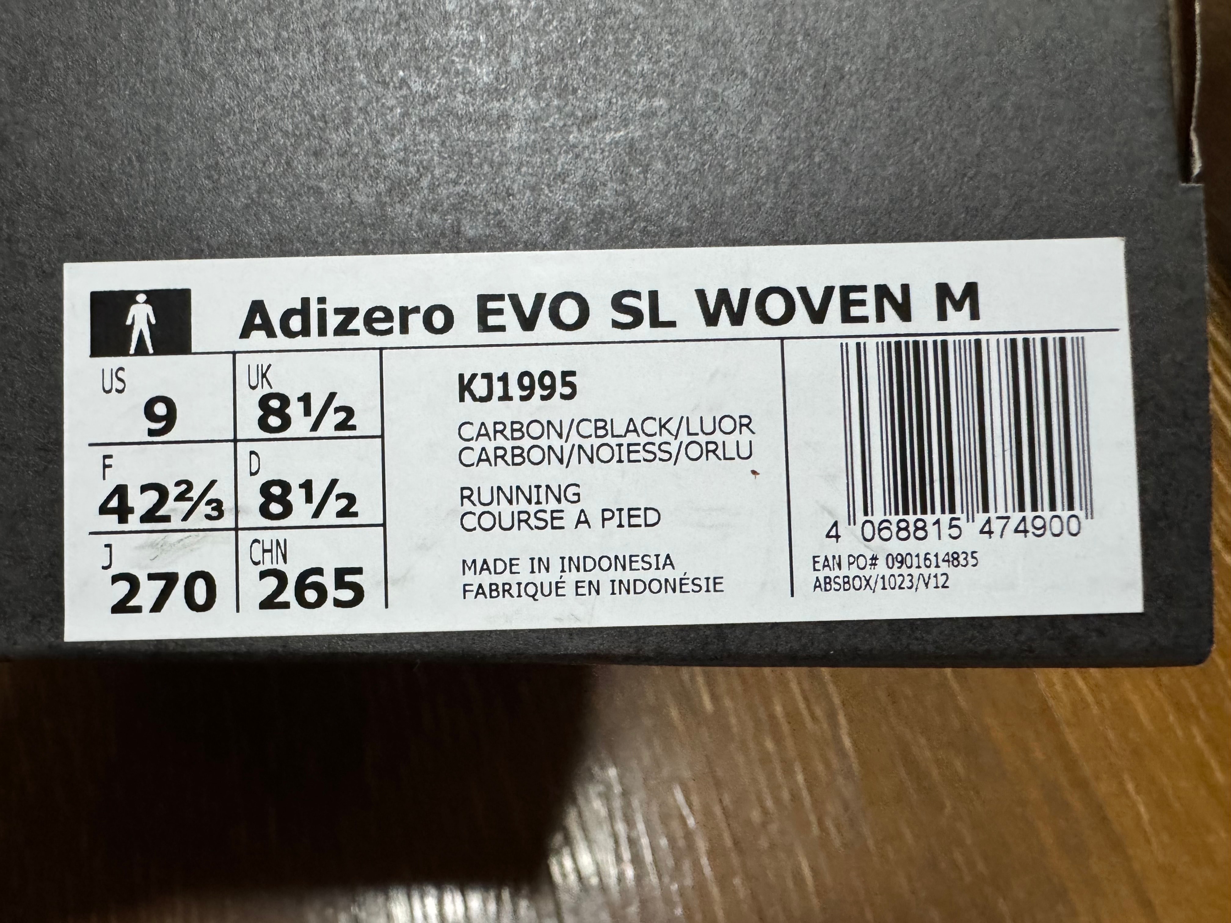 アディダス アディゼロ エヴォ SL ウーブン "カーボン/コアブラック/ルシッドオレンジ"