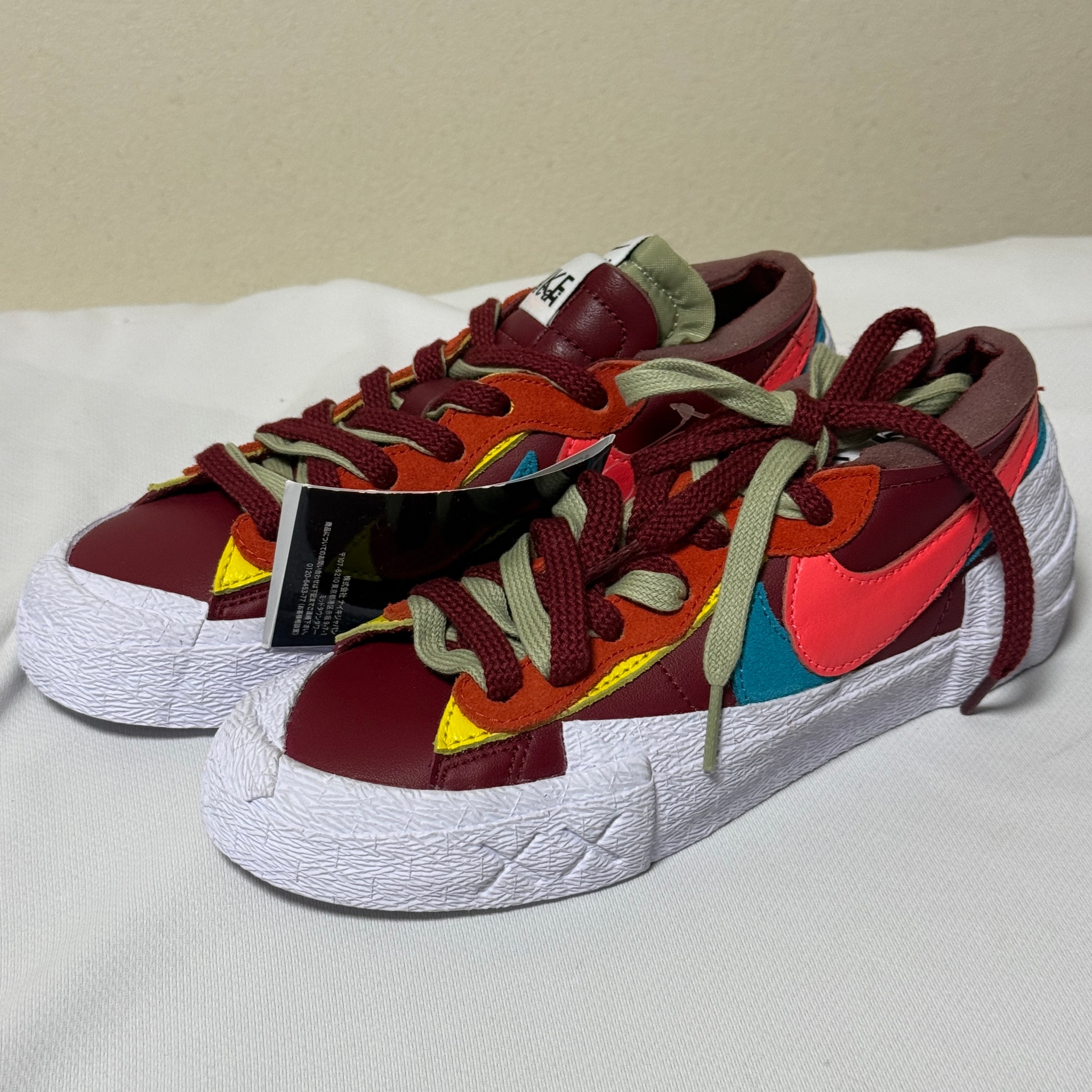 KAWS × sacai × Nike Blazer Low "Team Red"