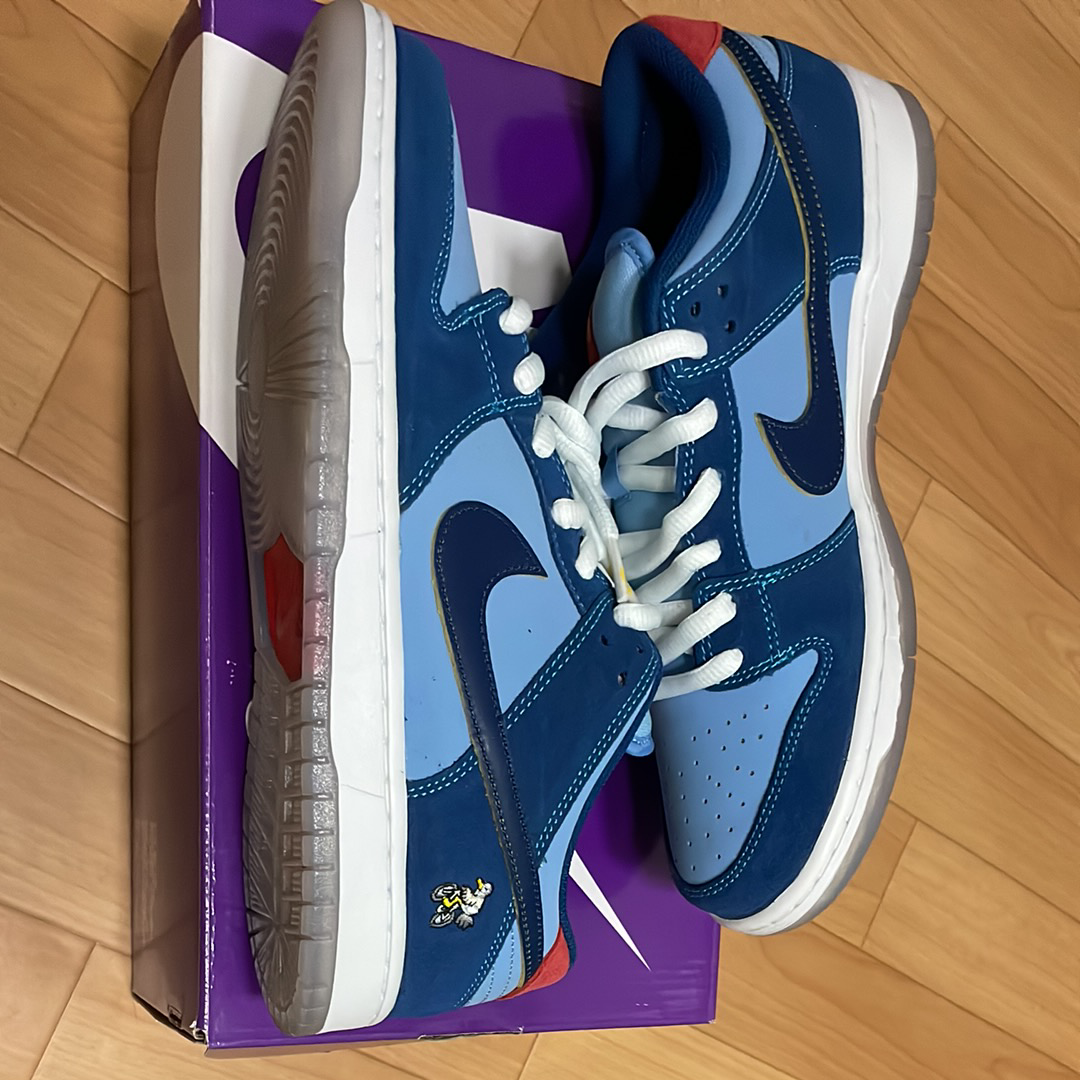 ワイ ソー サッド? × ナイキ SB ダンクロー "コースタルブルー/スピードイエロー-ユニバーシティレッド"