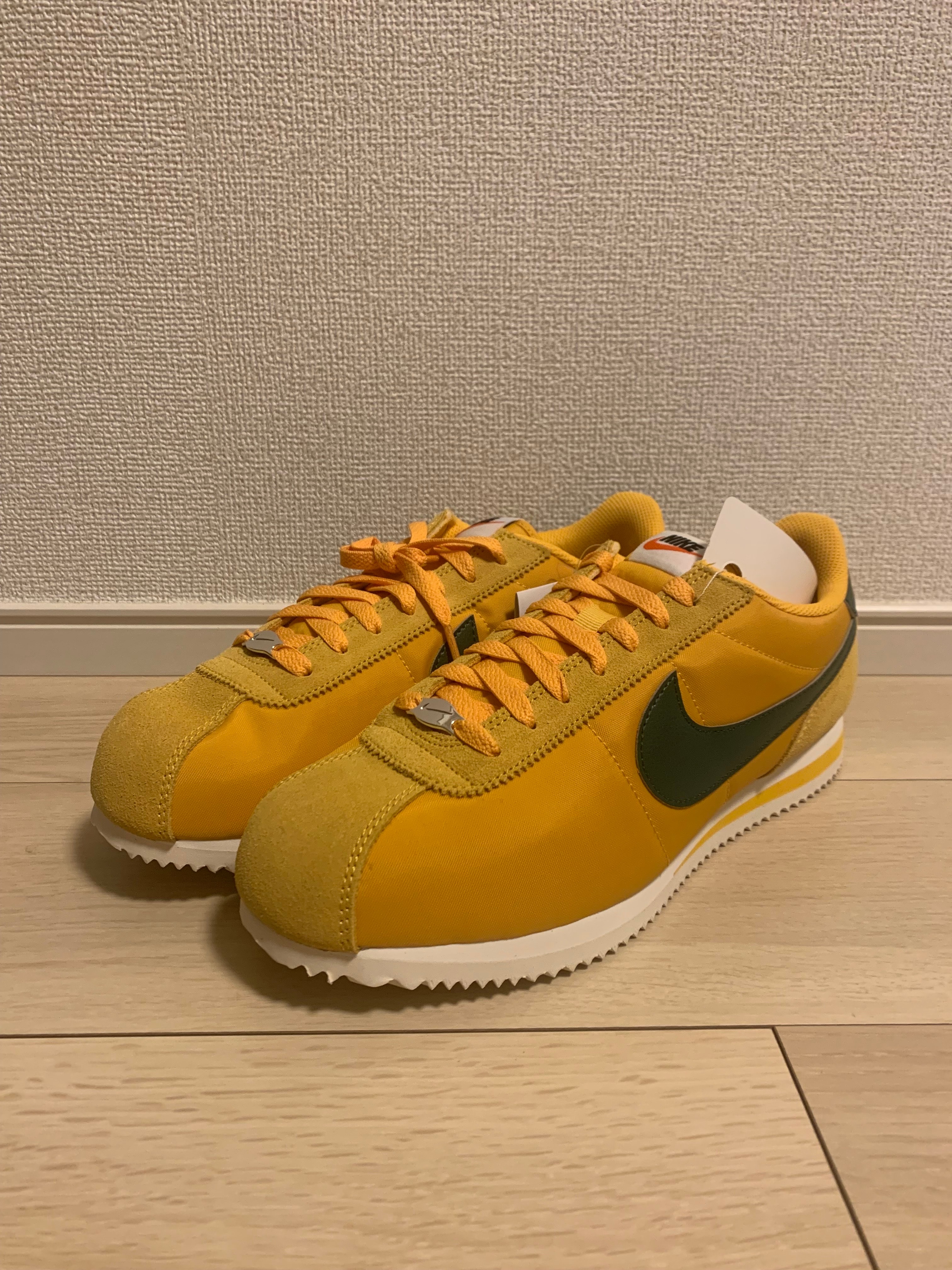 ナイキ ウィメンズ コルテッツ TXT "イエローオークル/ゴージグリーン"