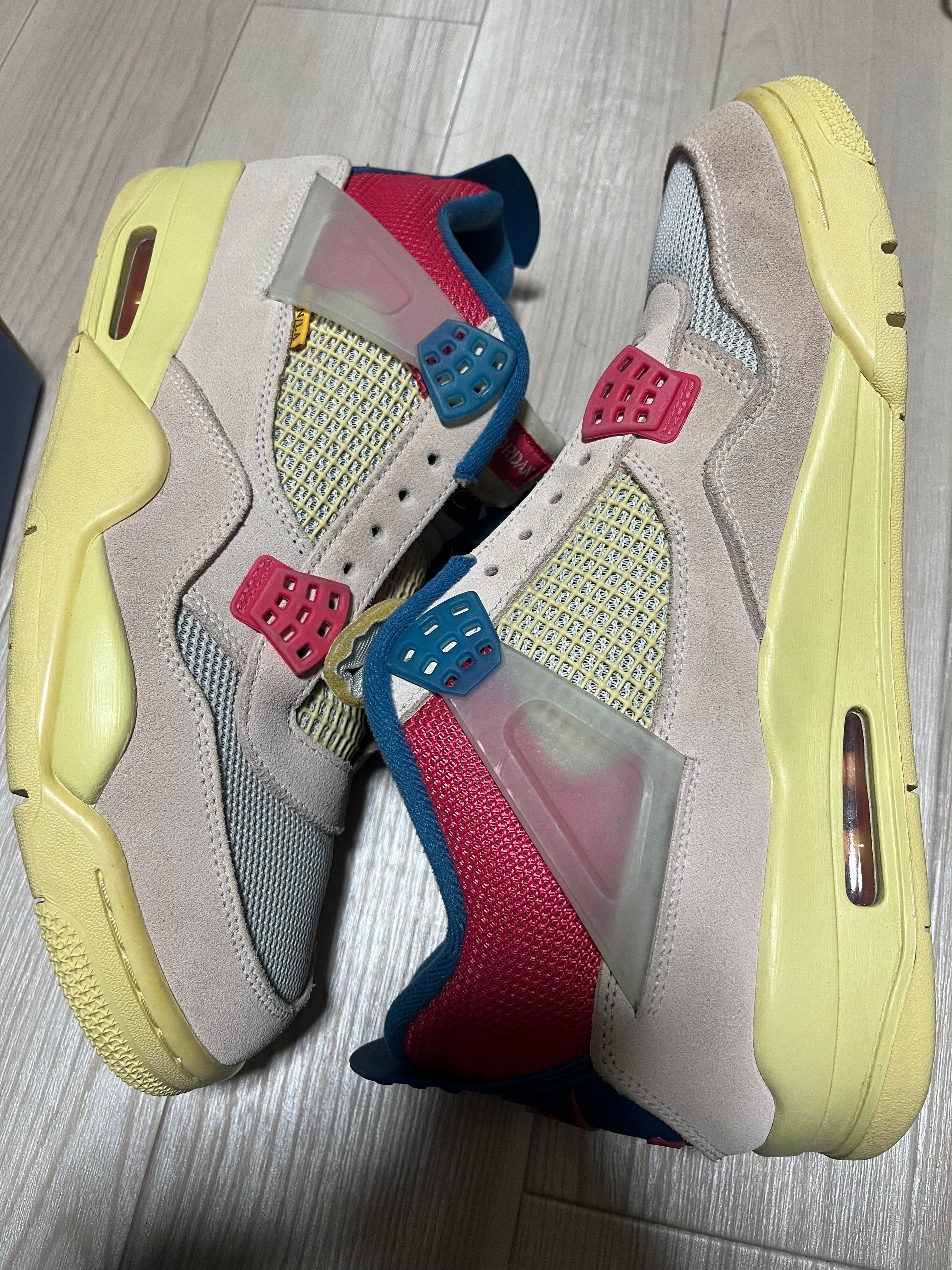 UNION × Nike Air Jordan 4 SP "Guava Ice/Light Fusion Red"