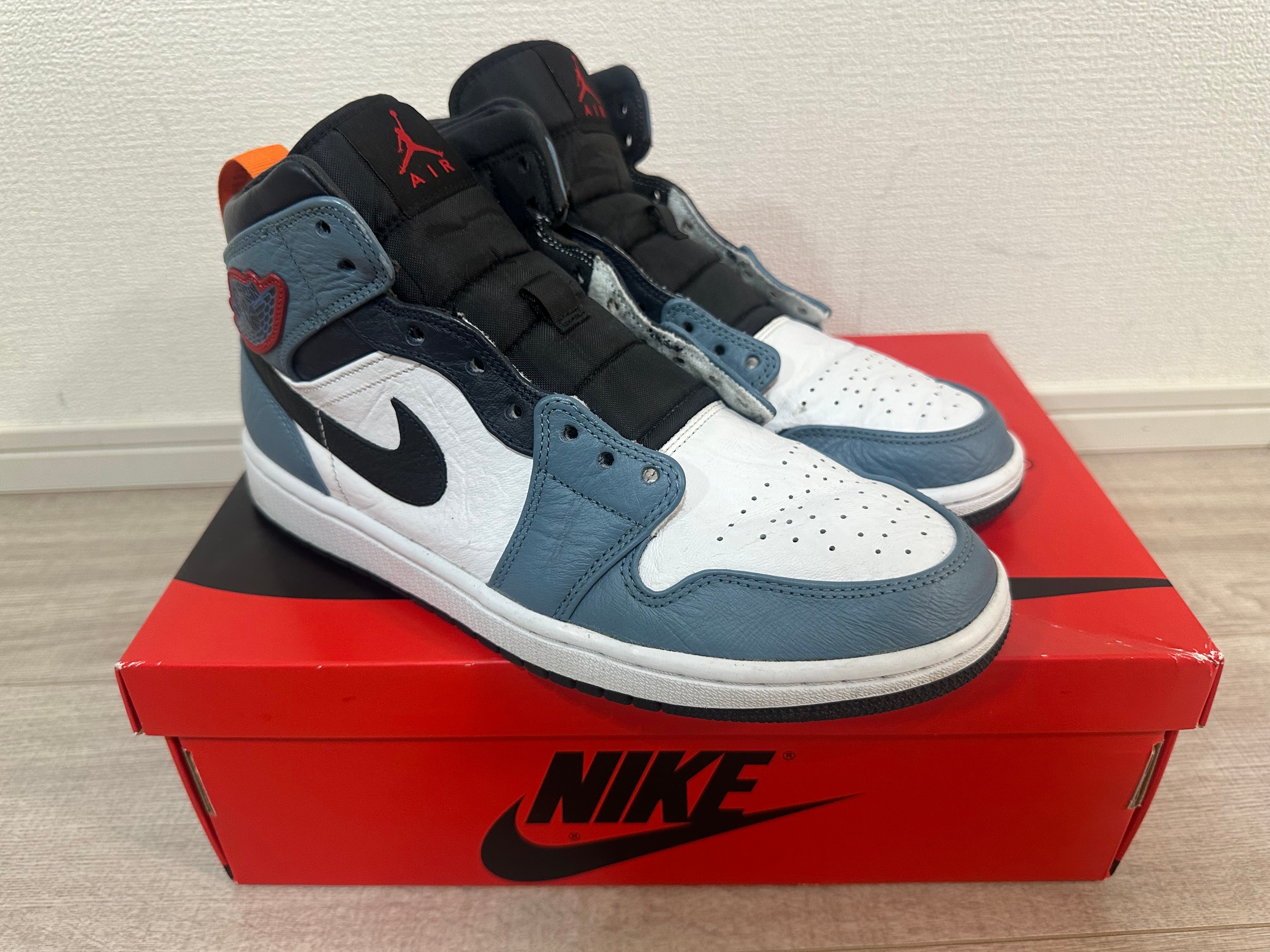 ファセッタズム × ナイキ エアジョーダン1 ミッド "ホワイト/ネイビー"