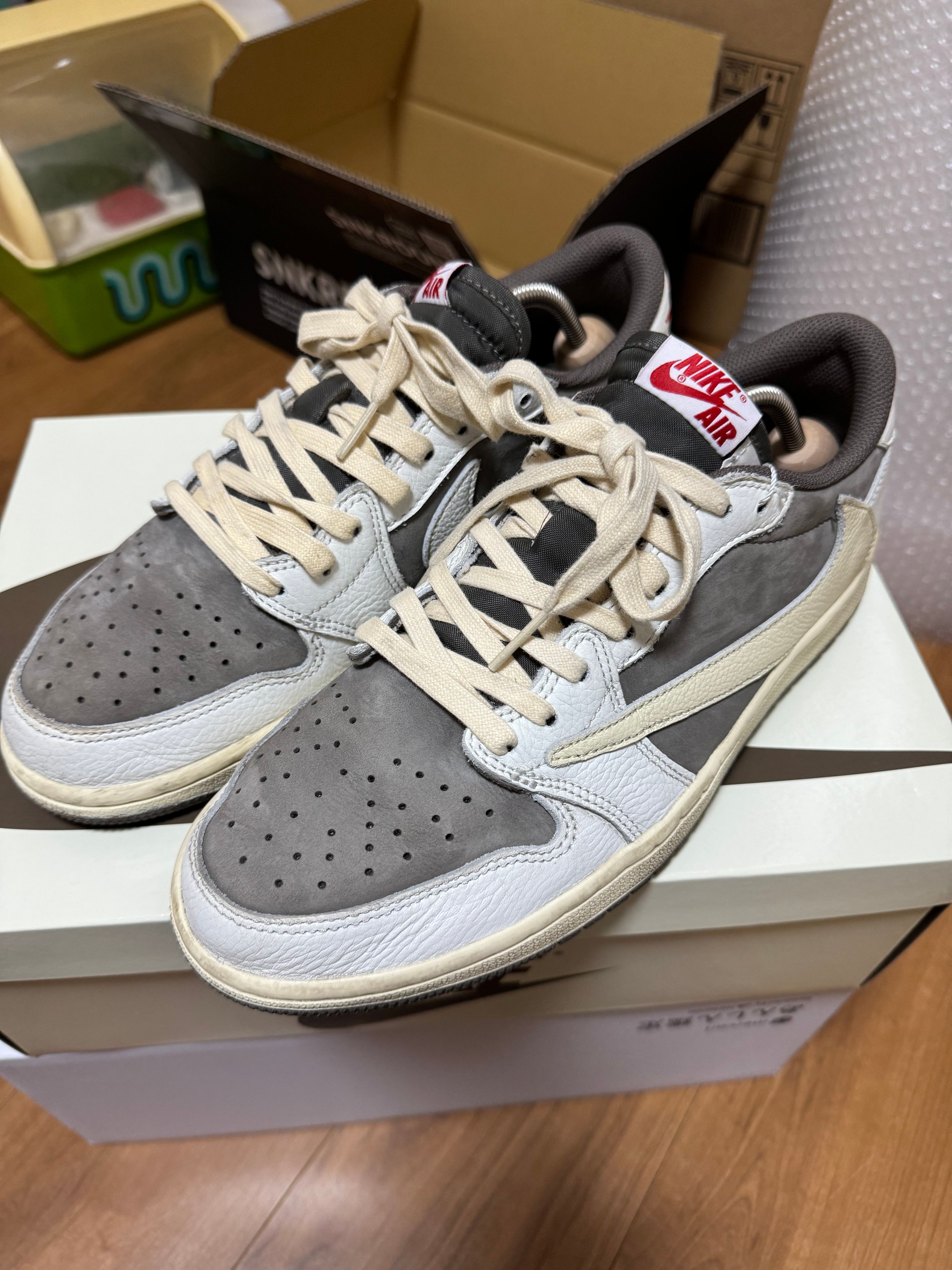 Travis Scott × Nike Air Jordan 1 Low OG SP "Reverse Mocha/Sail and Ridgerock"