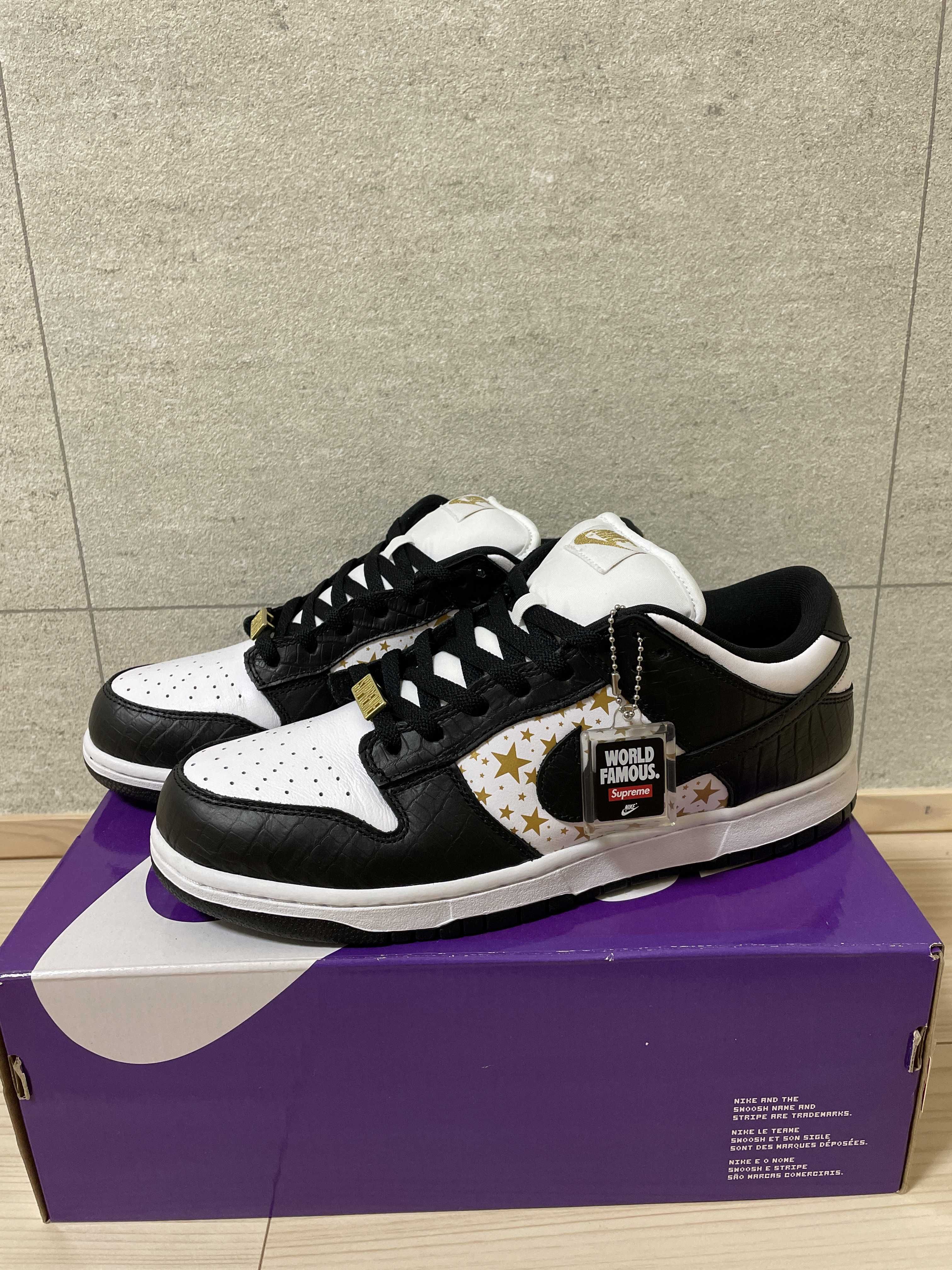 Supreme × Nike SB Dunk Low OG QS Gold Stars "White/Black"