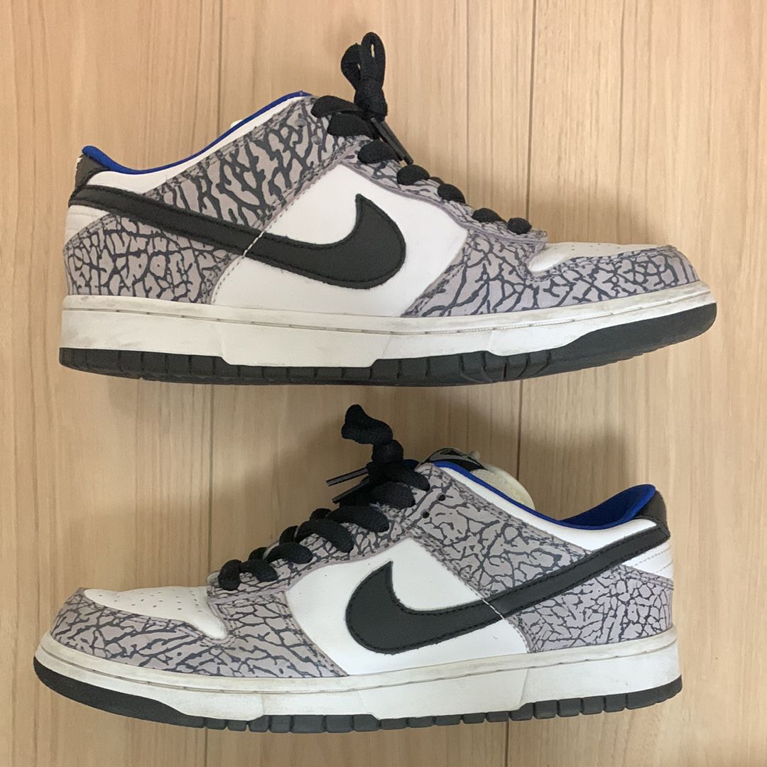 Supreme × Nike SB Dunk Low "White Cement/Safari" (2002)