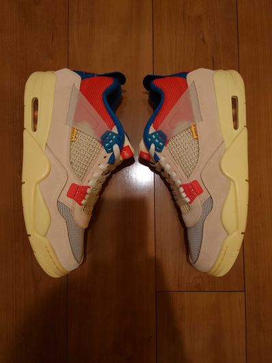 UNION × Nike Air Jordan 4 SP "Guava Ice/Light Fusion Red"