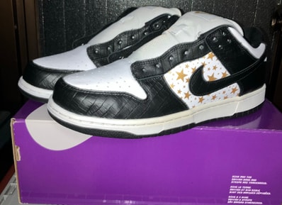 Supreme × Nike SB Dunk Low OG QS Gold Stars "White/Black"