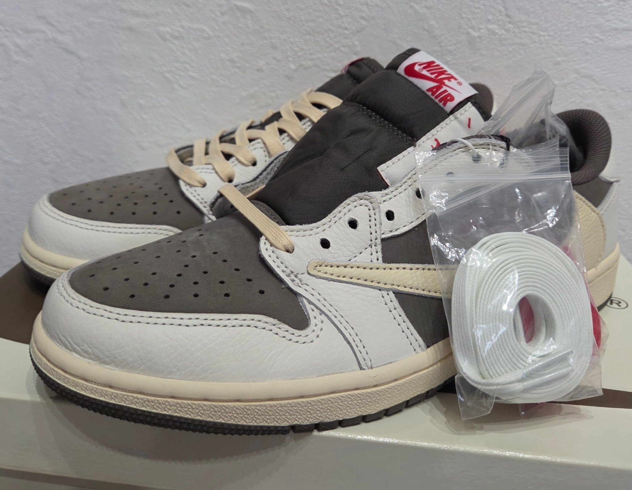 Travis Scott × Nike Air Jordan 1 Low OG SP "Reverse Mocha/Sail and Ridgerock"