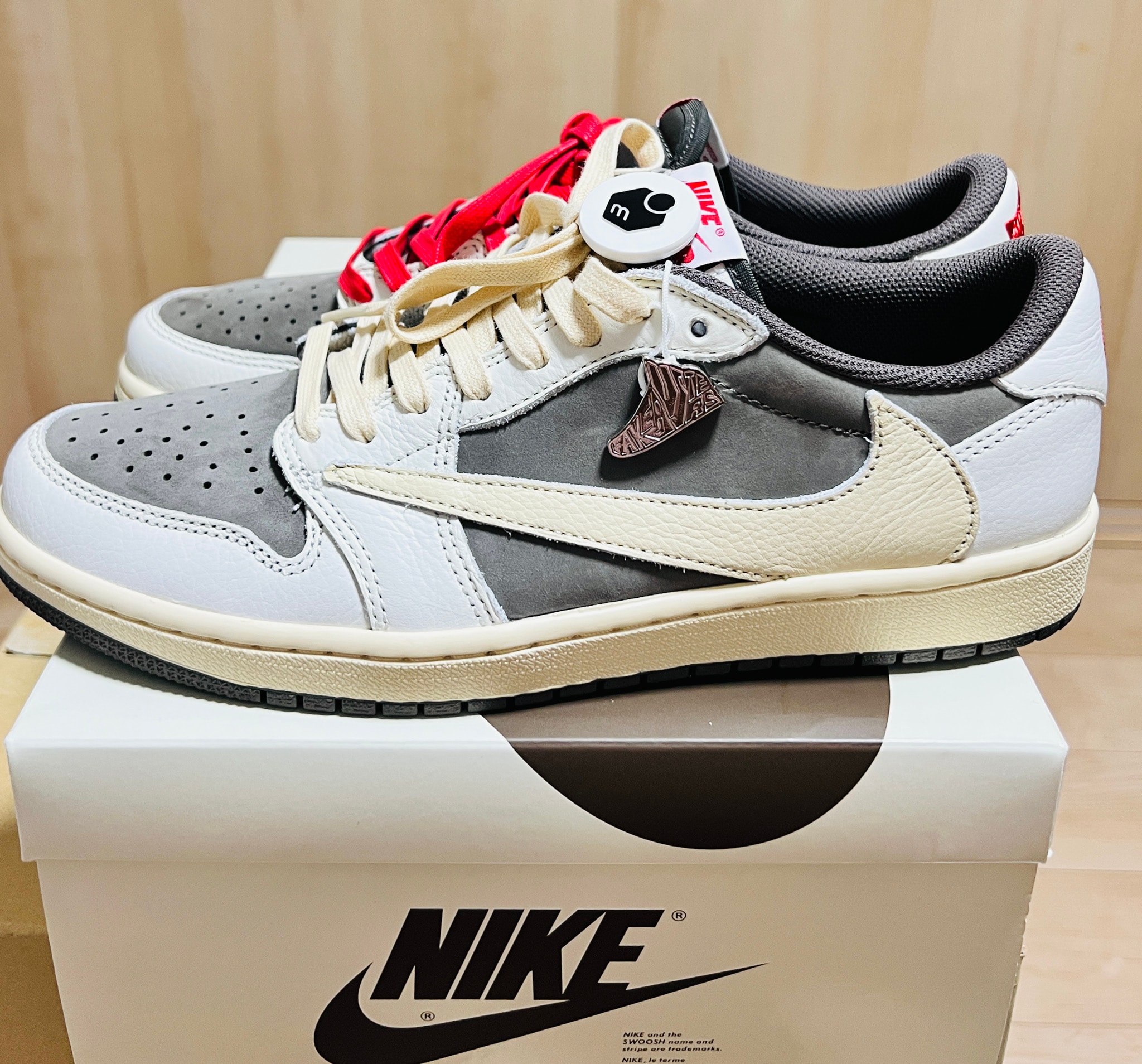 Travis Scott × Nike Air Jordan 1 Low OG SP "Reverse Mocha/Sail and Ridgerock"