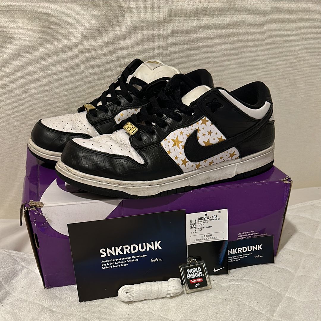 Supreme × Nike SB Dunk Low OG QS Gold Stars "White/Black"