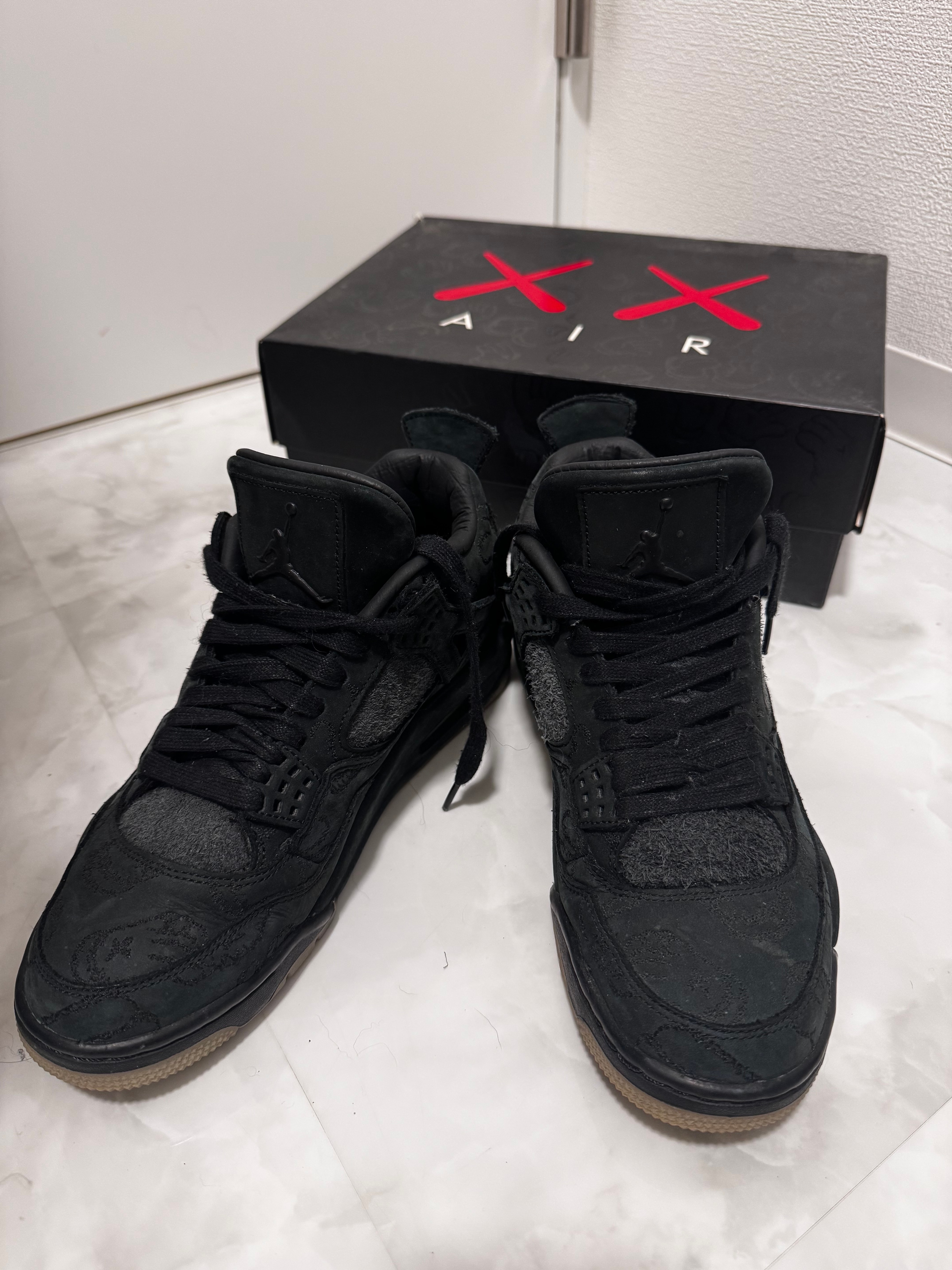KAWS × Nike Air Jordan 4 Retro "Black"