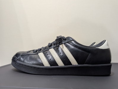 KITH Ronnie Fieg × adidas Superstar Vintage Made in Germany "Black Tie"